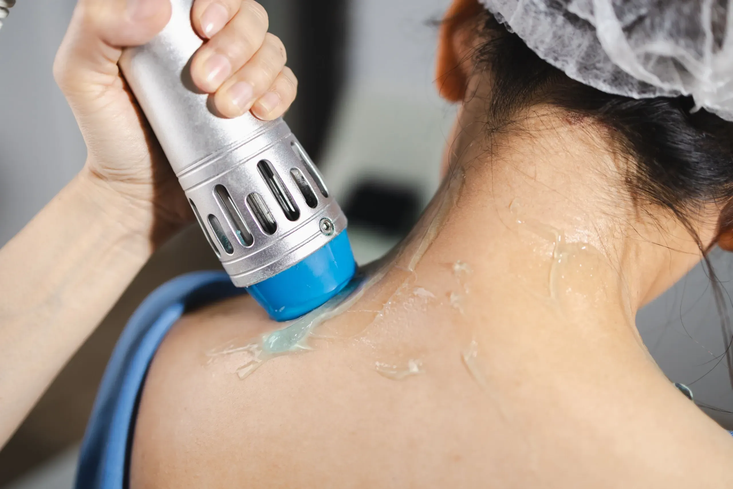Patient moving comfortably after a course of shockwave therapy at Bergtold Chiropractic in Naples
