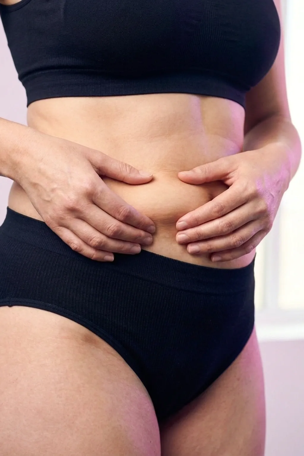 Midsection showing stubborn abdominal fat and reduced muscle tone assessed at Applegate MedSpa in Covington