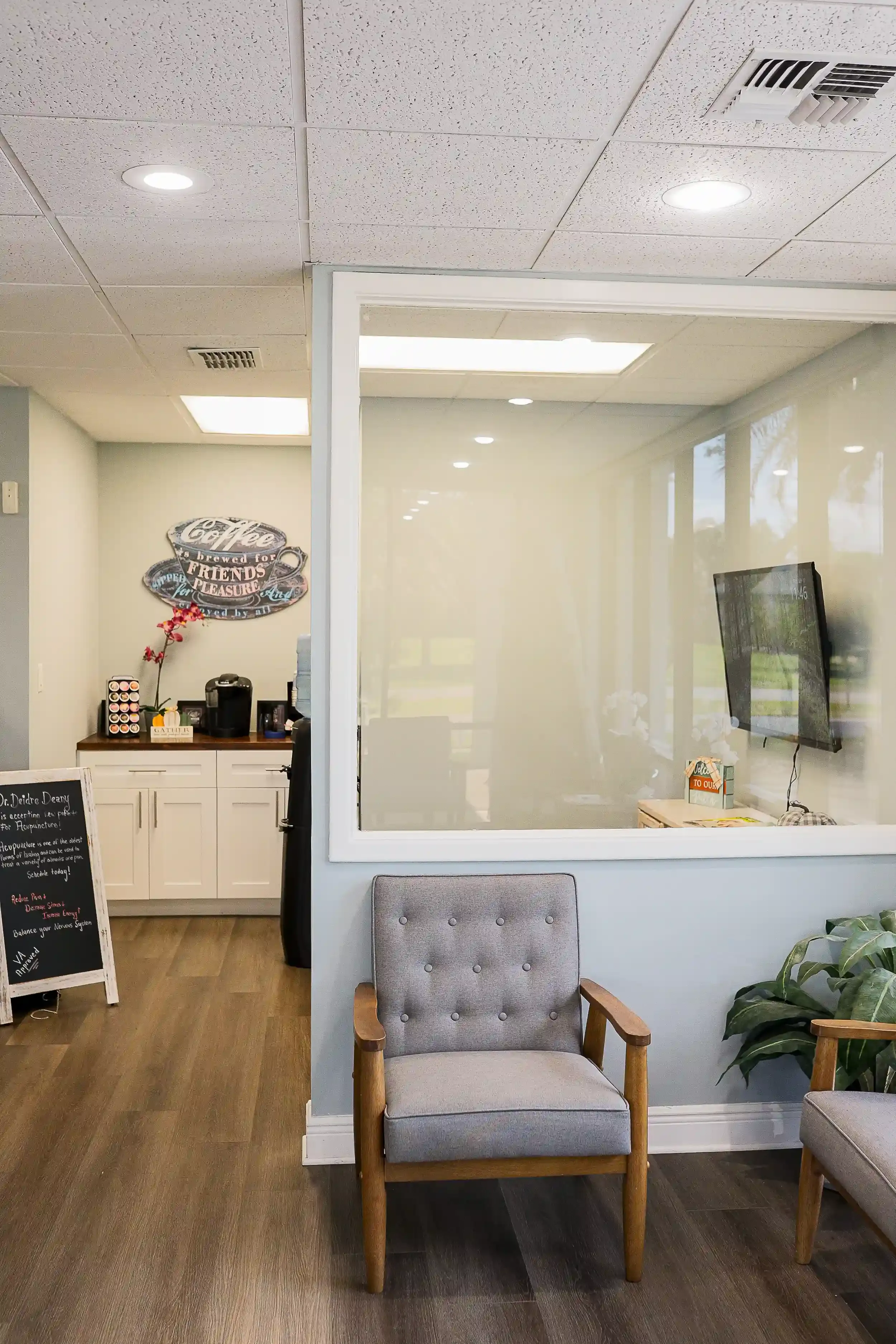 Spine-Ability Apollo Beach video tour thumbnail showing reception, treatment rooms and BTL Advanced Wellness suite