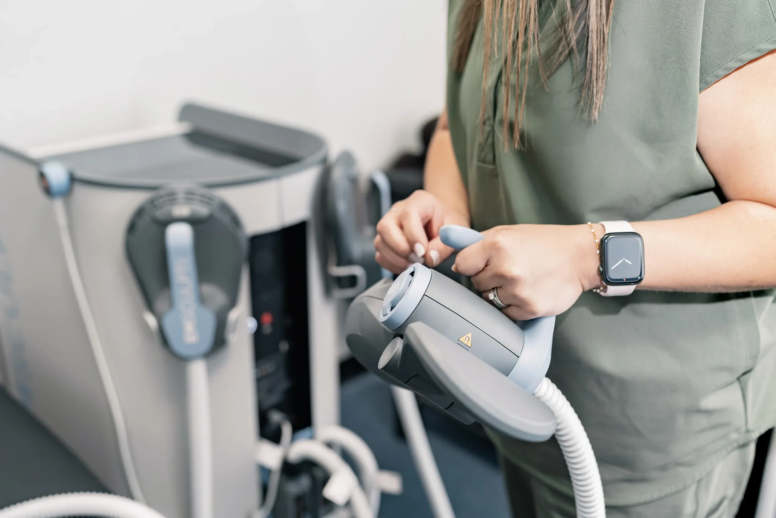 Patient receiving body contouring treatment with no text or labels visible at Bensa Chiropractic and Wellness in Bradenton Florida