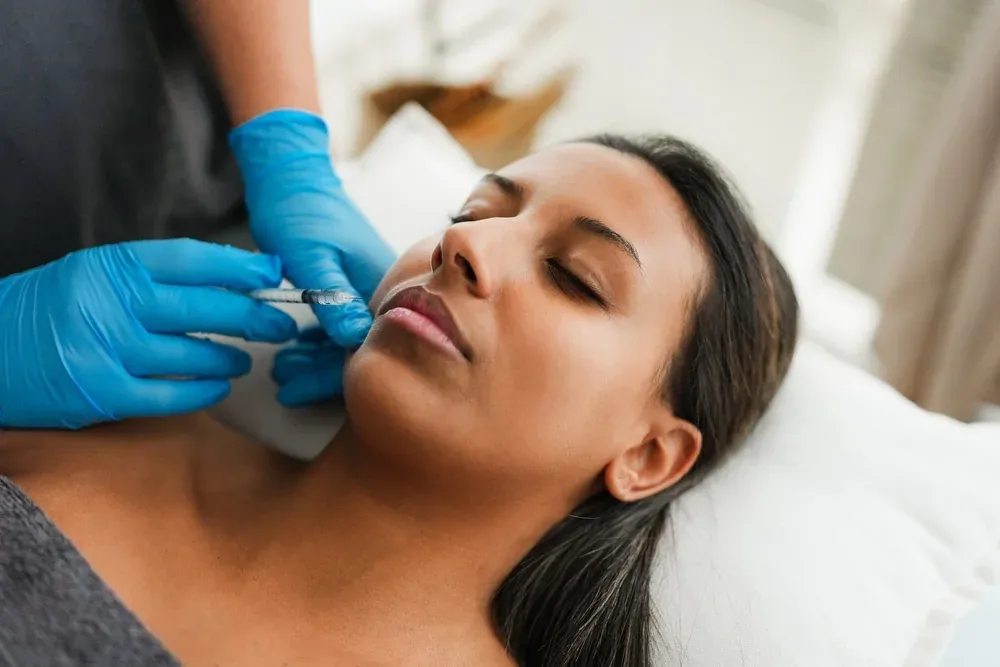 Abstract soft gradient background representing lip enhancement treatments