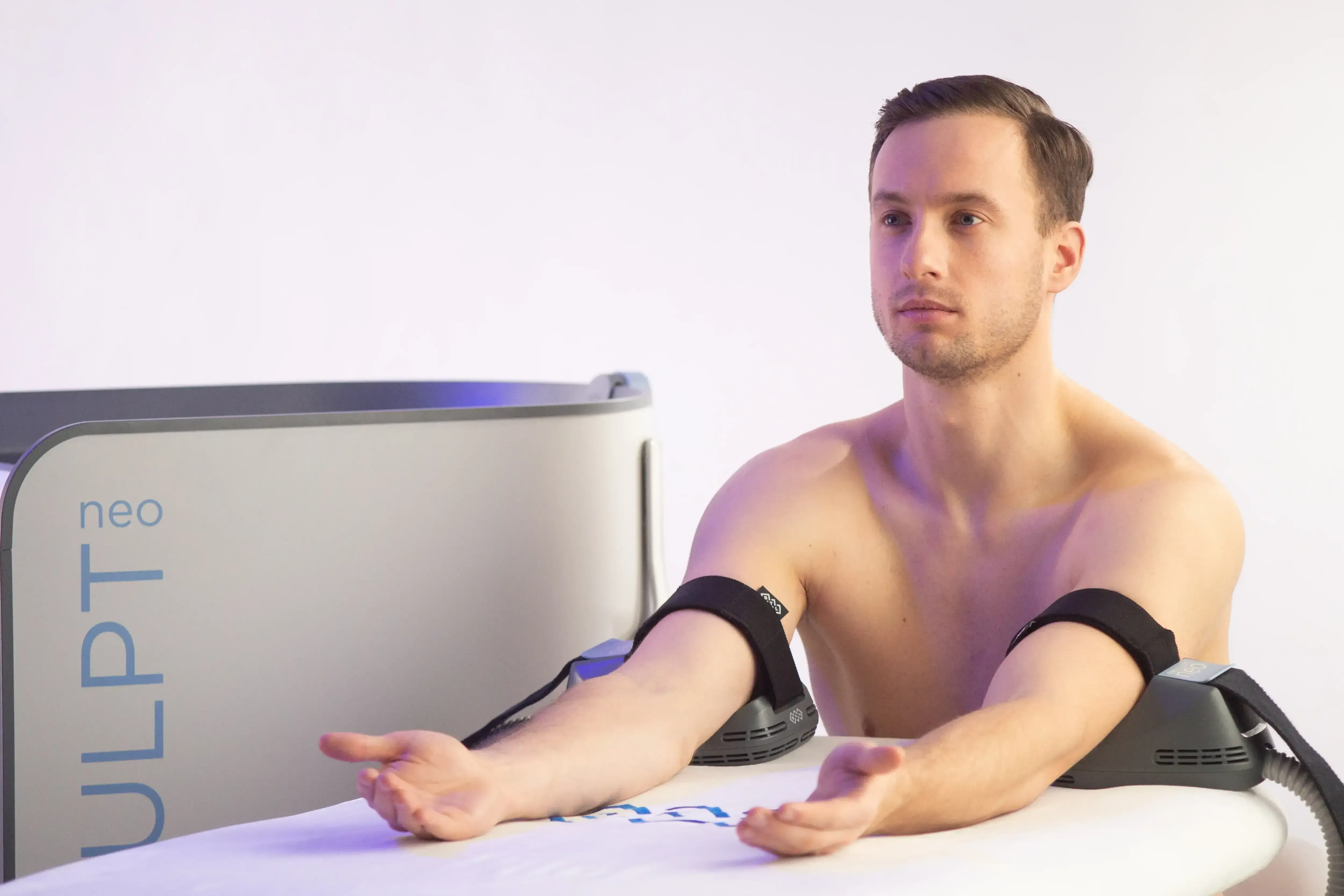 Patient receiving Emsculpt Neo pain relief treatment at Pain Treatment Center of Maryland in Reisterstown