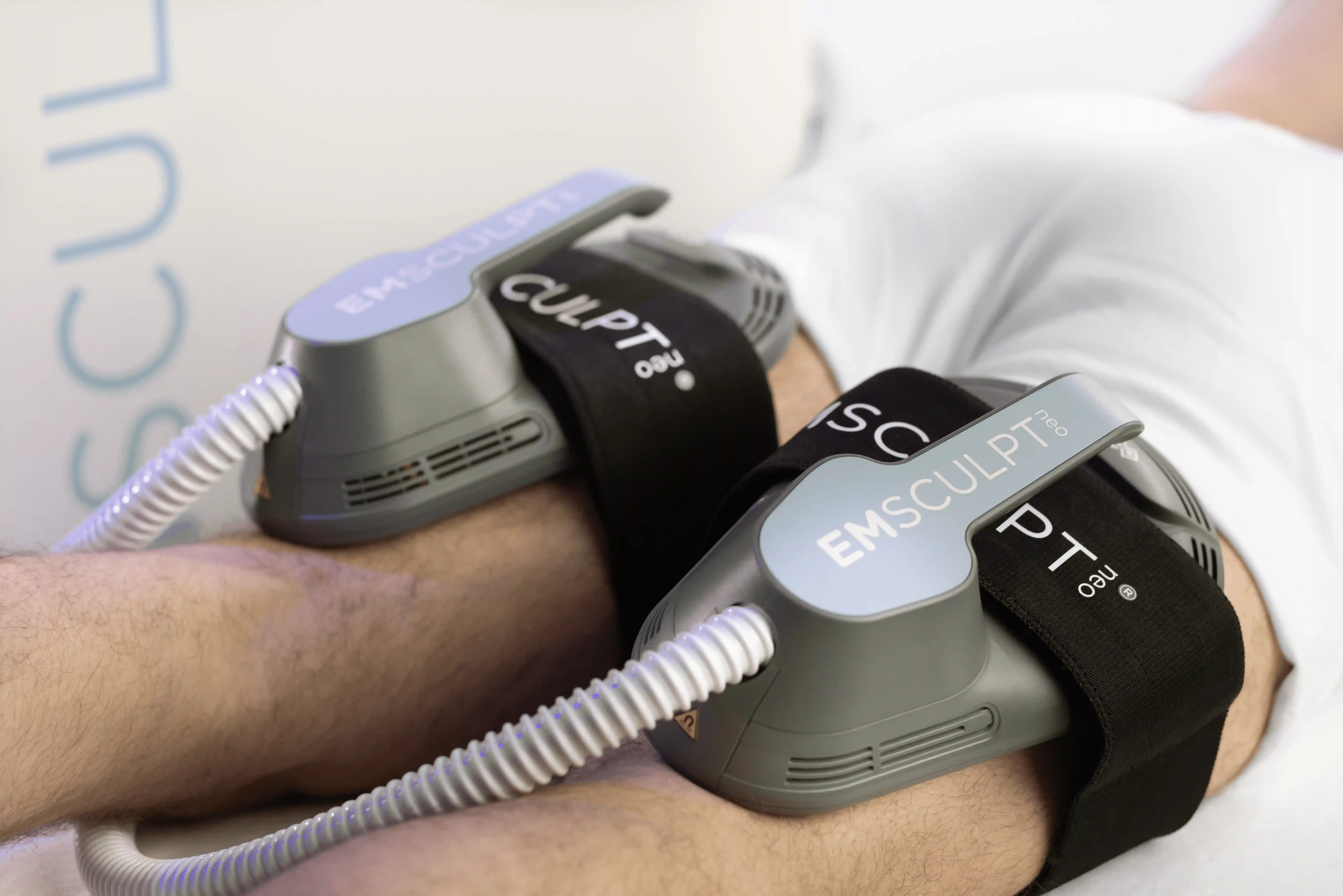Emsculpt Neo functional recovery applicator on a patient quadriceps at Emerald Coast Ortho in Fort Walton Beach, FL