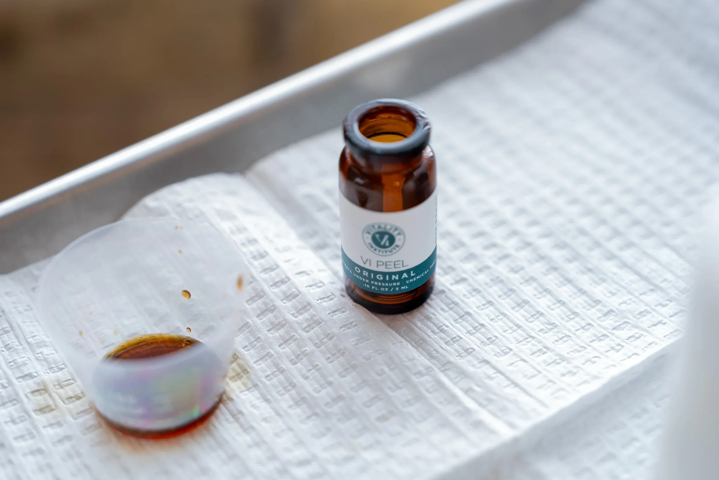 Before and after VI Chemical Peel results showing improved skin tone at Eternal Wellness Traverse City