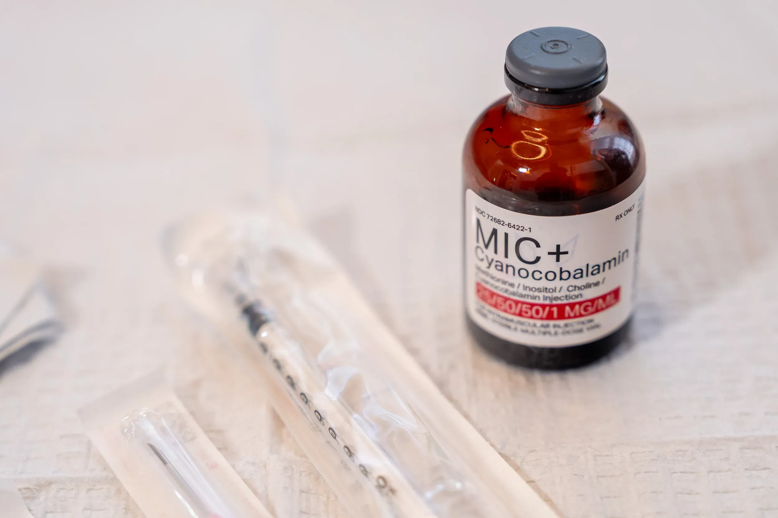 Before and after IM vitamin therapy results showing improved wellness at Eternal Wellness Traverse City