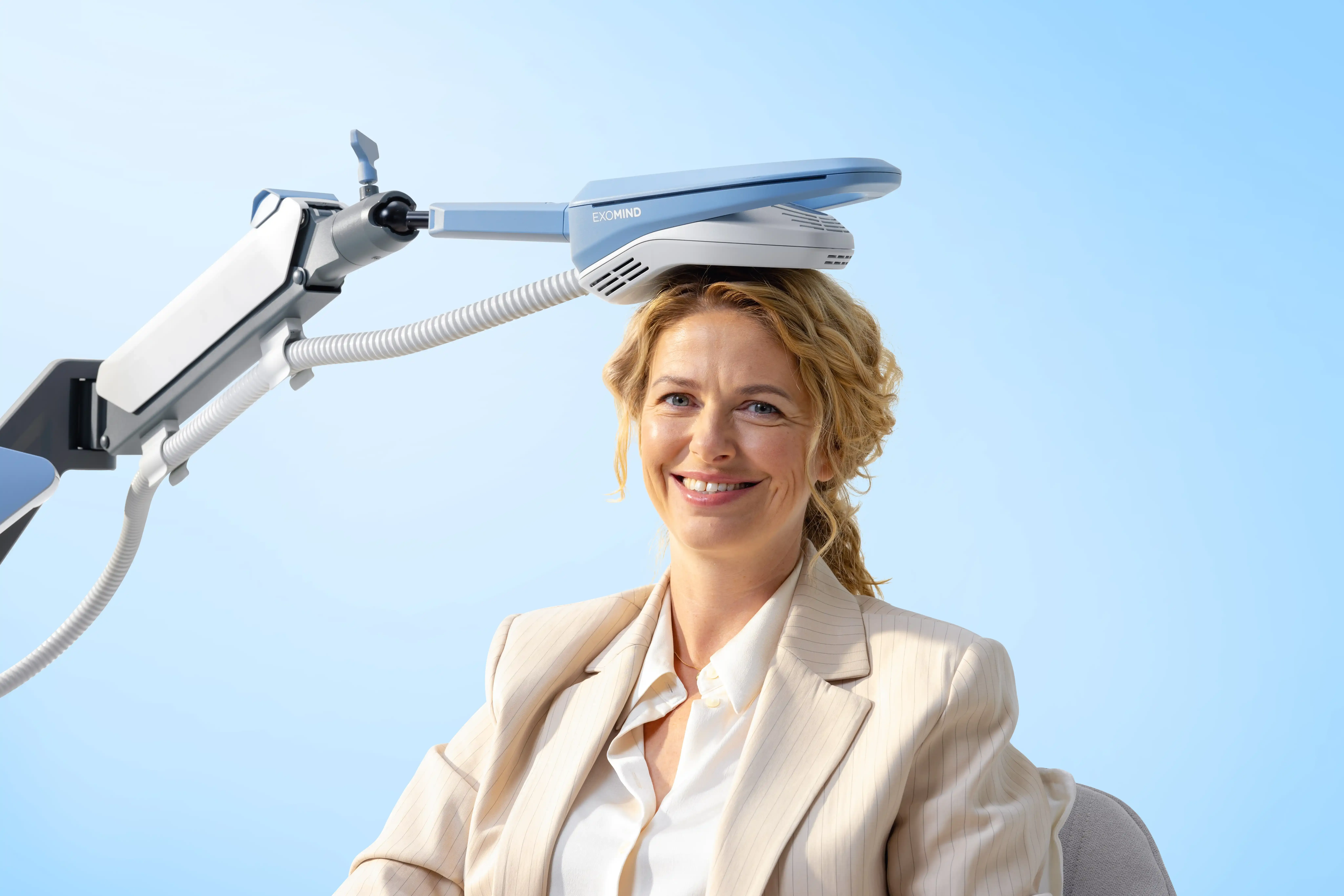 Patient experiencing improved focus after TMS therapy with Exomind at ProActive Chiropractic Tampa