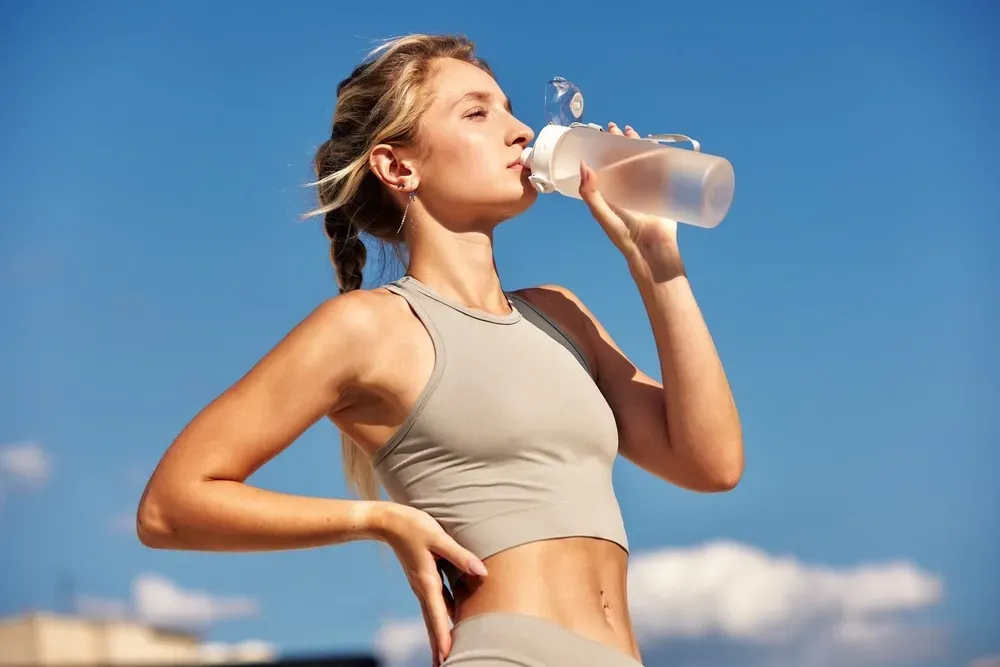 Patient discussing gut health concerns with Dr. Korman at Arise Integrative Wellness Port Charlotte