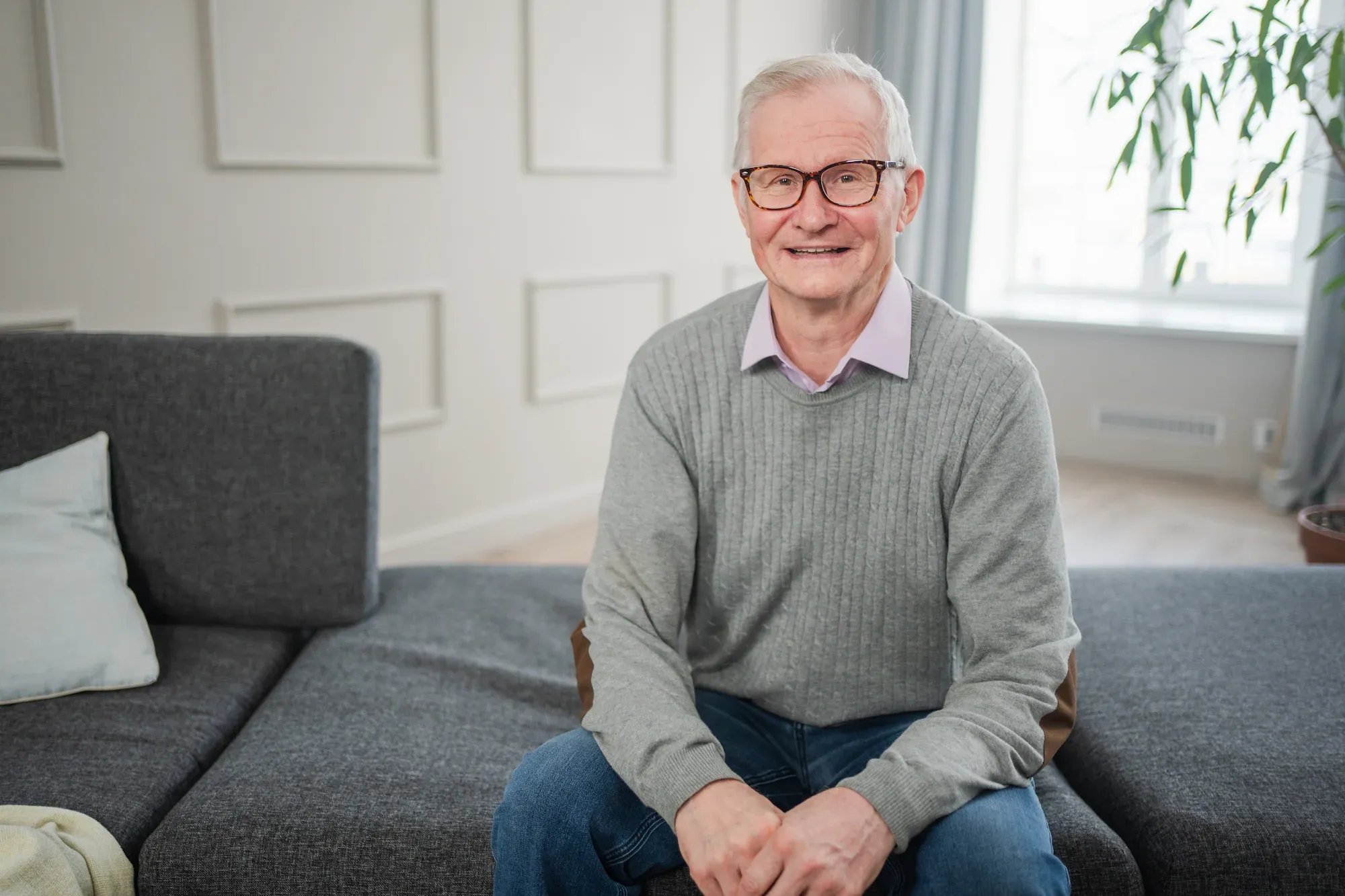 Person concerned about radiating leg pain at Precision Chiropractic Rockford