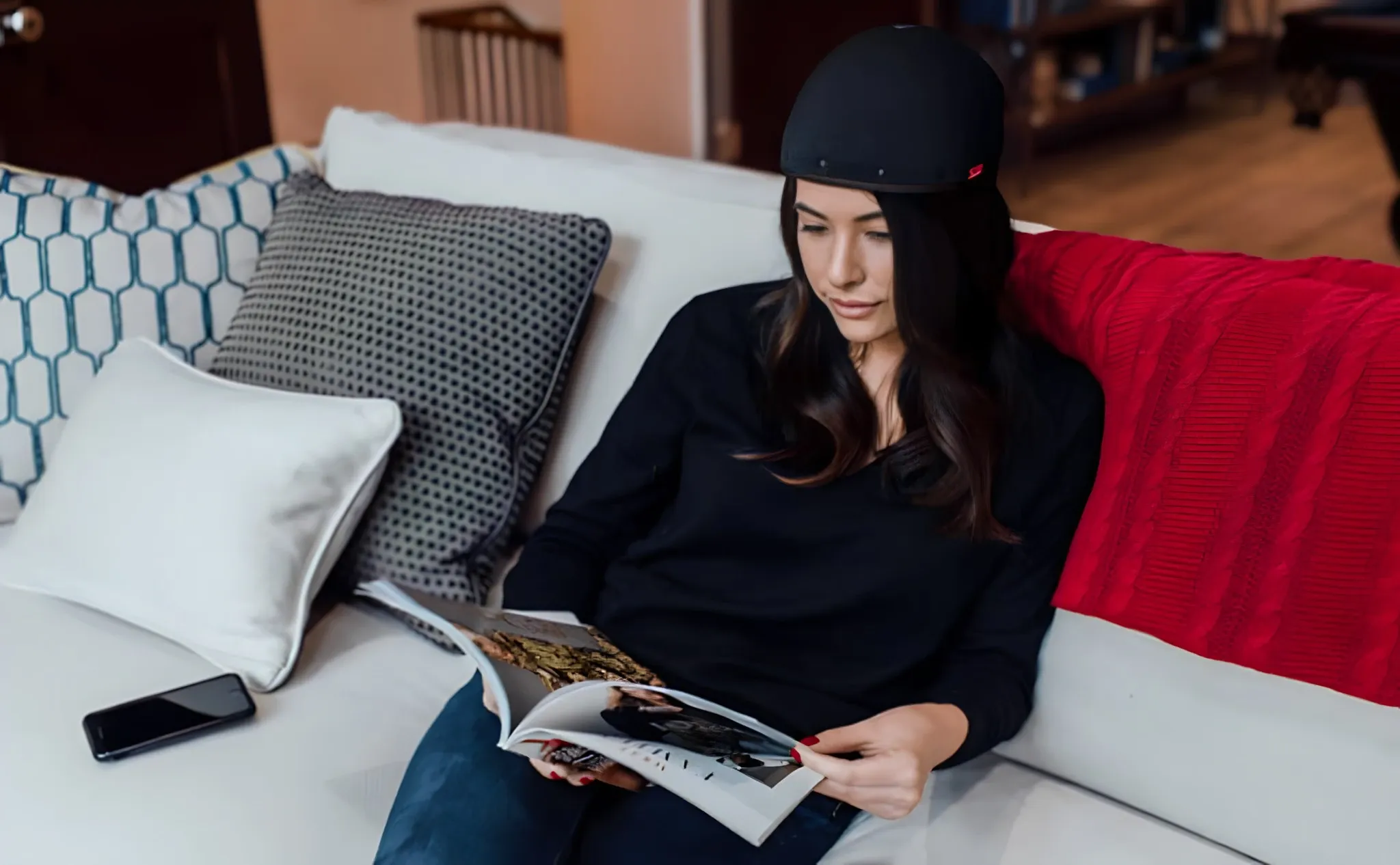 Patient wearing Revian laser cap for hair growth at DSI Hair in Algonquin, IL