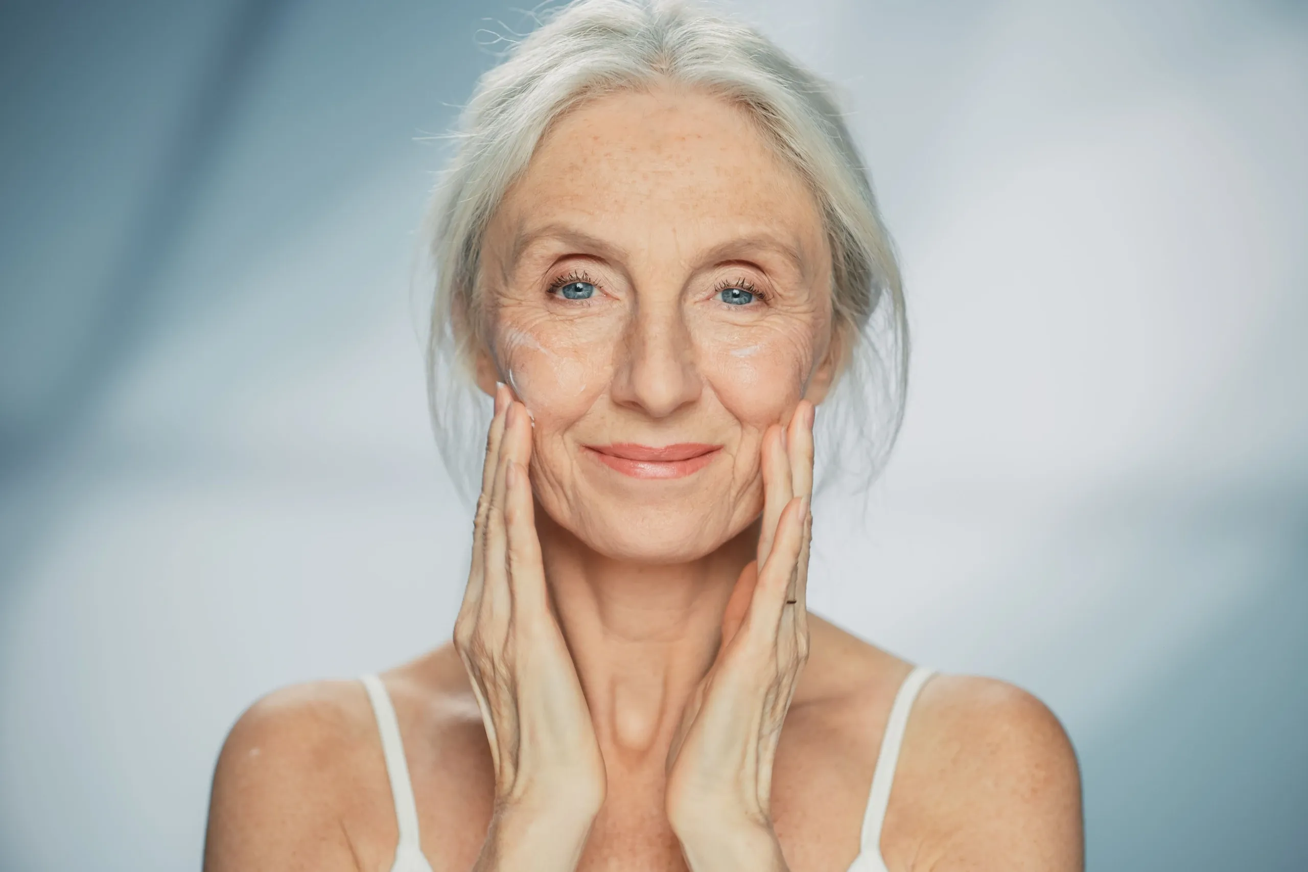 Confident patient portrait after Glo2Facial at Mint Aesthetics Indianapolis