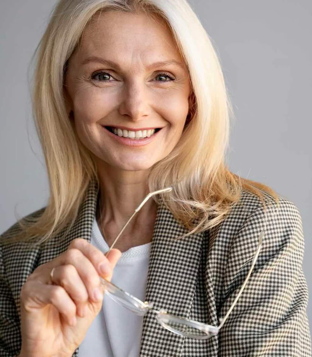 Woman concerned about skin laxity at Mint Aesthetics & Skin