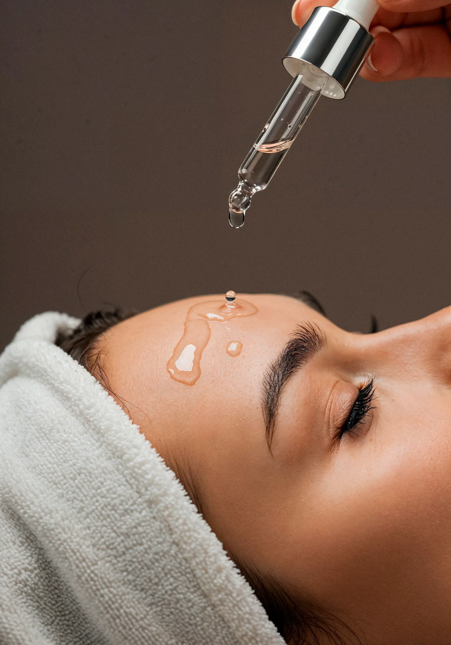 Before and after firming facial results showing improved skin tone at Mint Aesthetics Indianapolis