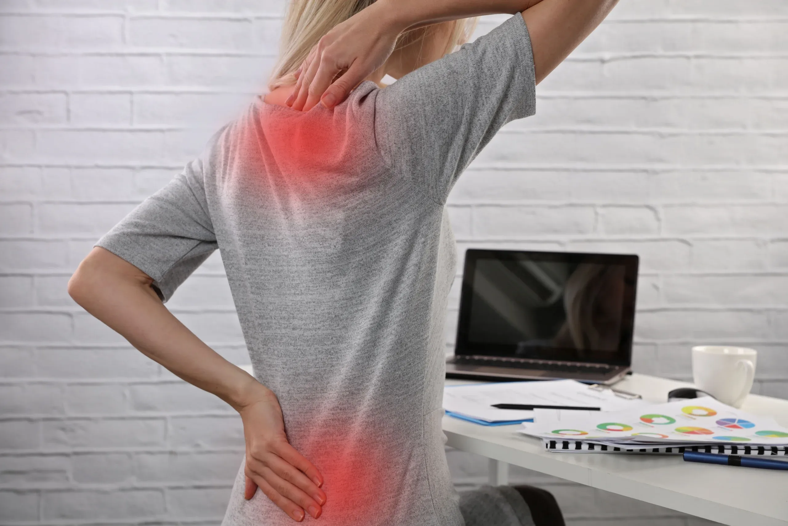 Patient receiving chiropractic adjustments for lower back pain in Alma, GA