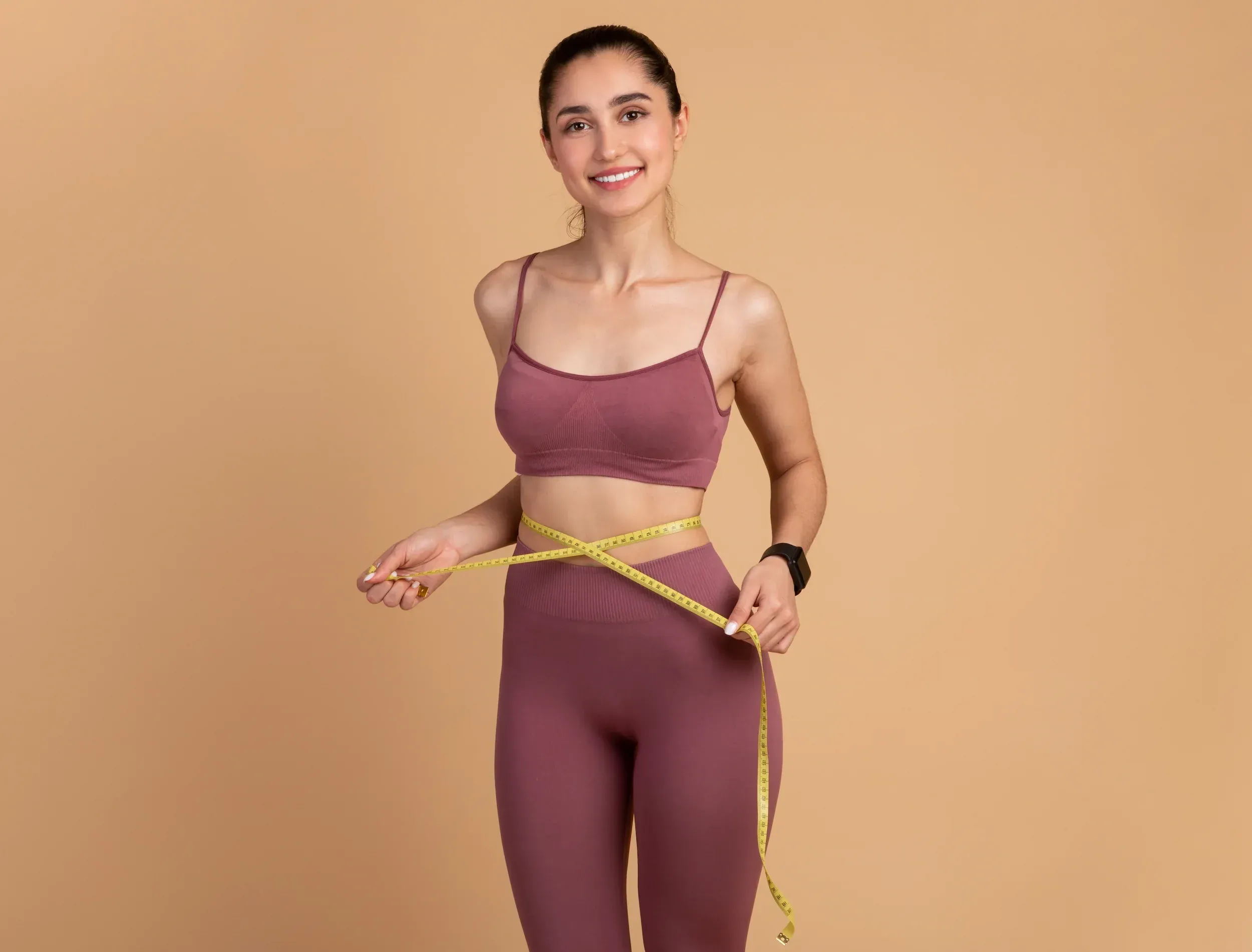 Confident patient consulting with Brittnee Keyes about body composition goals at Eternal Wellness