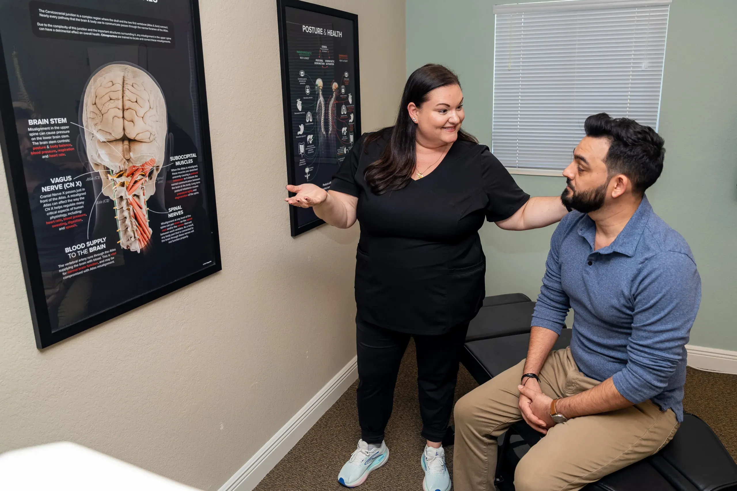 Patient consultation for chiropractic care at Arise Integrative Wellness Port Charlotte
