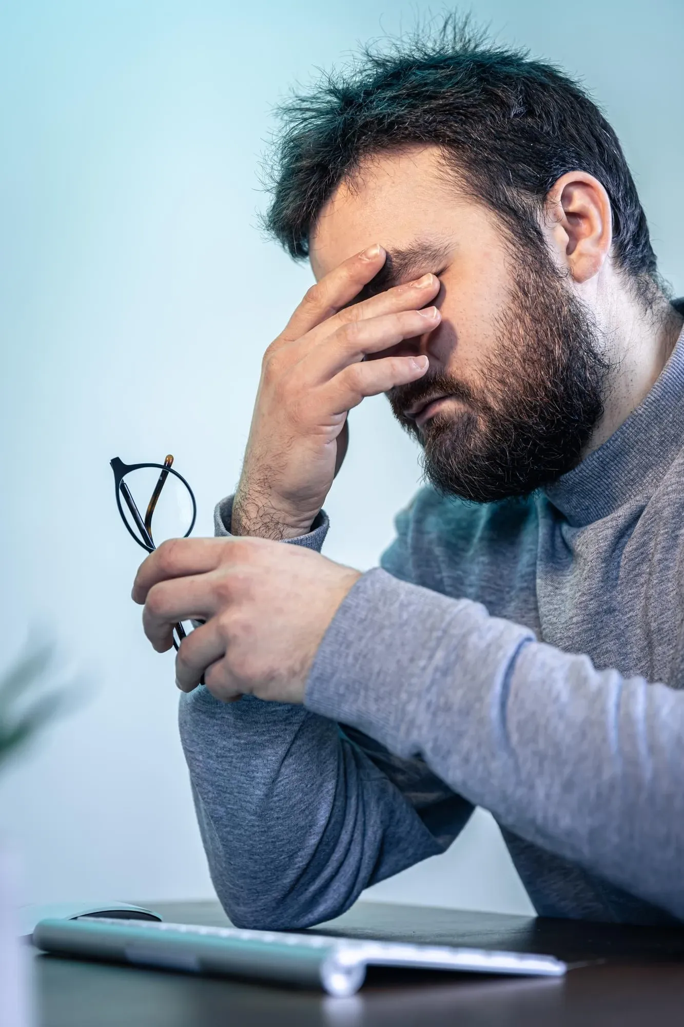 Person concerned about persistent fatigue at Physicians Ketamine Institute Destin