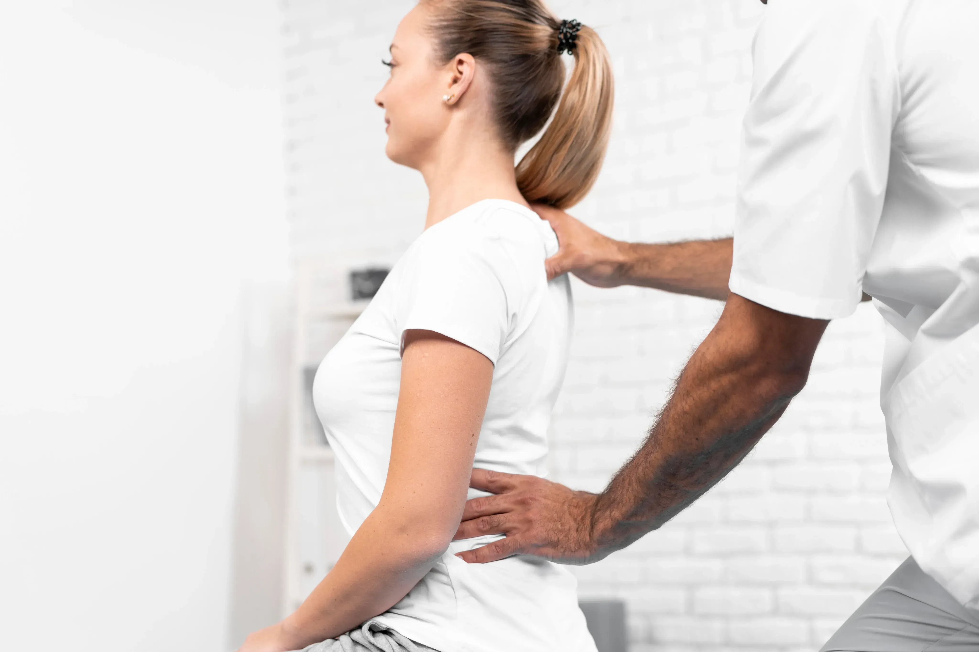 Provider reviewing MRI images with a patient at Spine-Ability