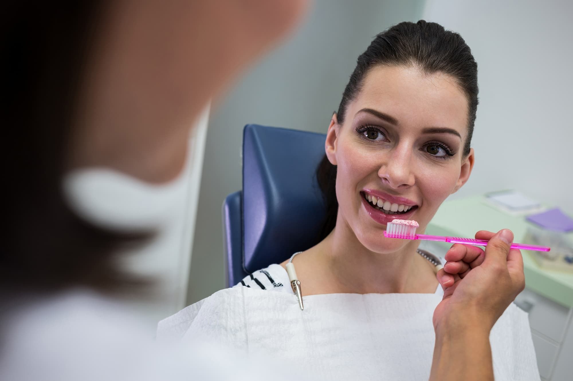 Patient receiving professional teeth cleaning at Enclave Dental in Lake Mary, FL