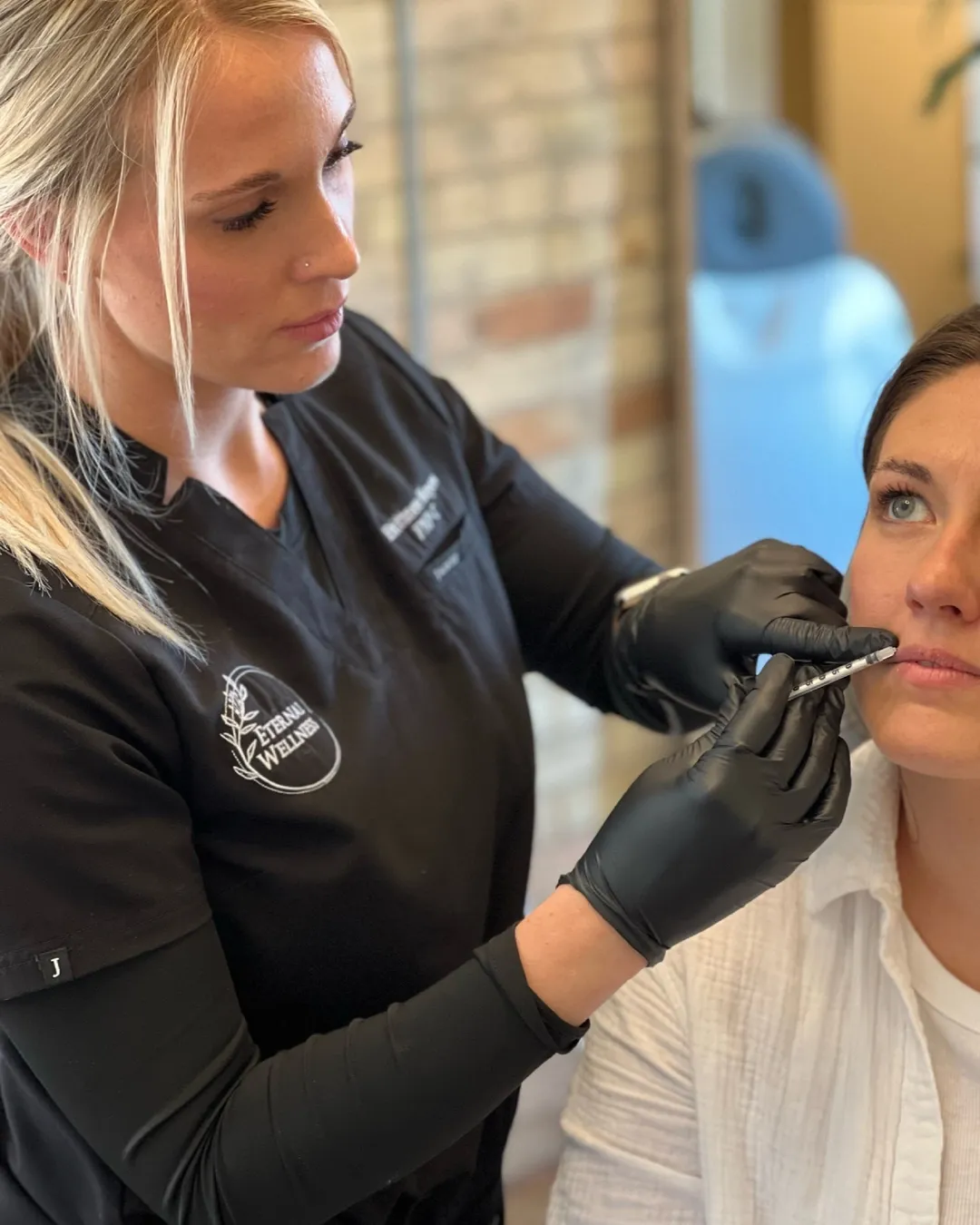 Confident patient portrait after dermal fillers at Eternal Wellness Traverse City