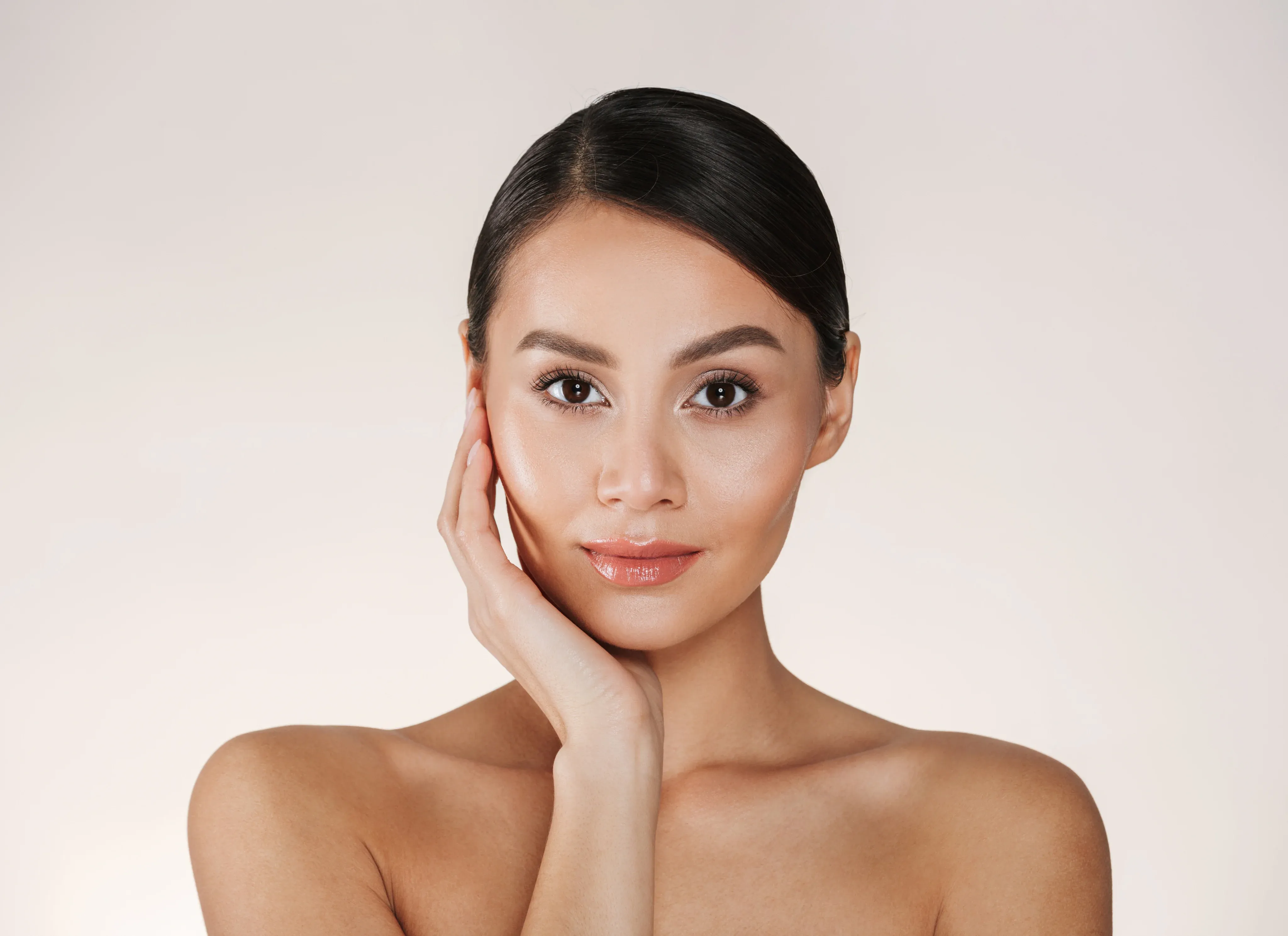 Abstract soft gradient background representing facial rejuvenation possibilities