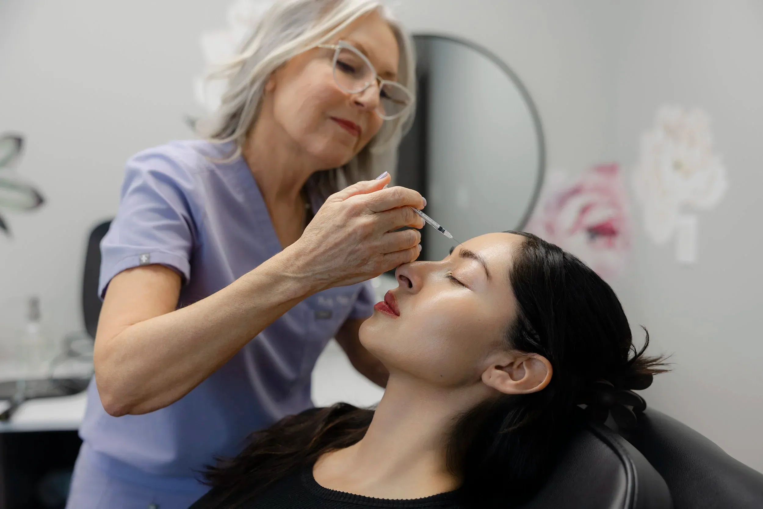 Patient receiving dermal filler treatment at Mint Aesthetics & Skin in Indianapolis, IN