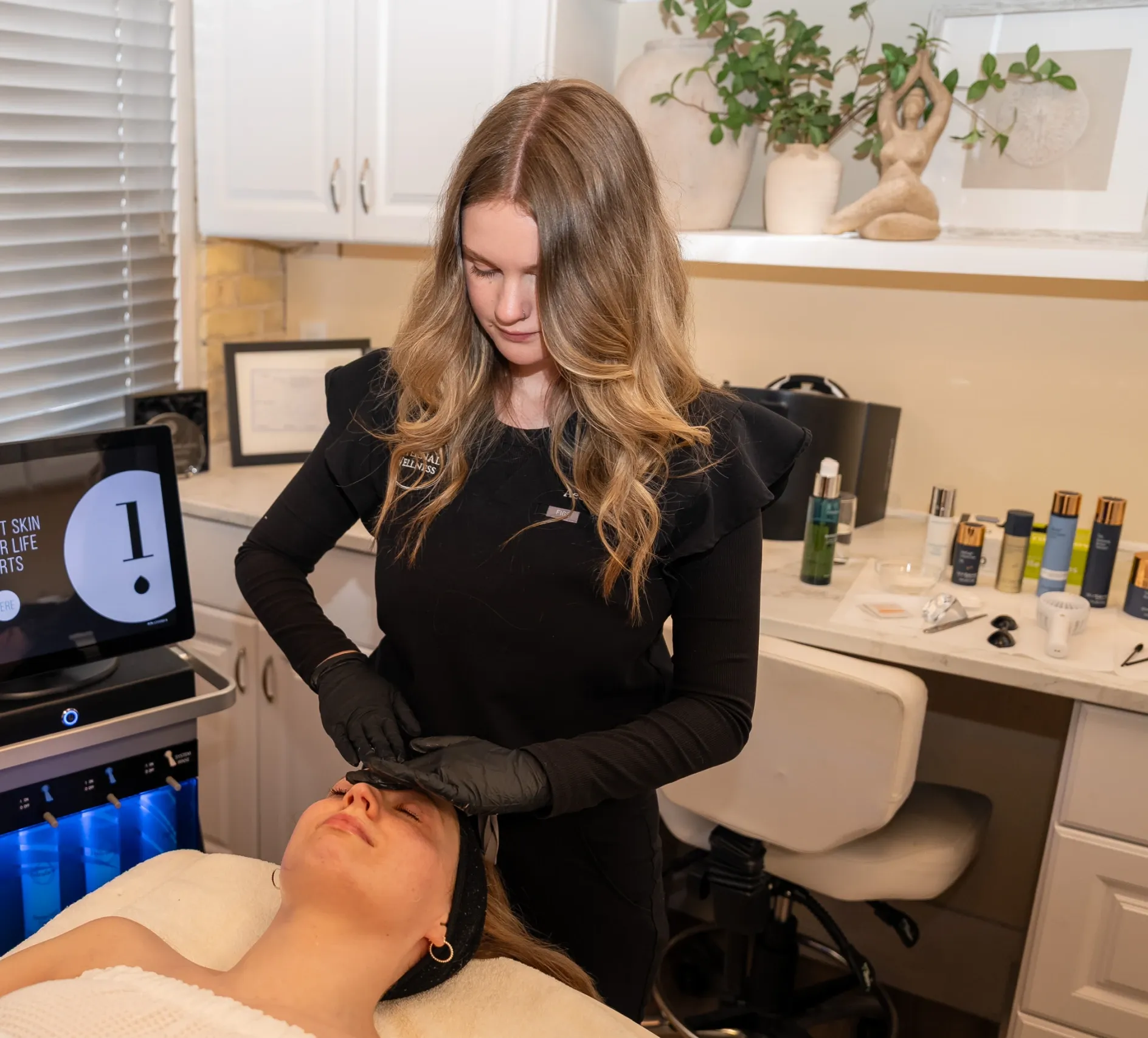 Patient consultation for dermaplaning at Eternal Wellness Medical Spa Traverse City