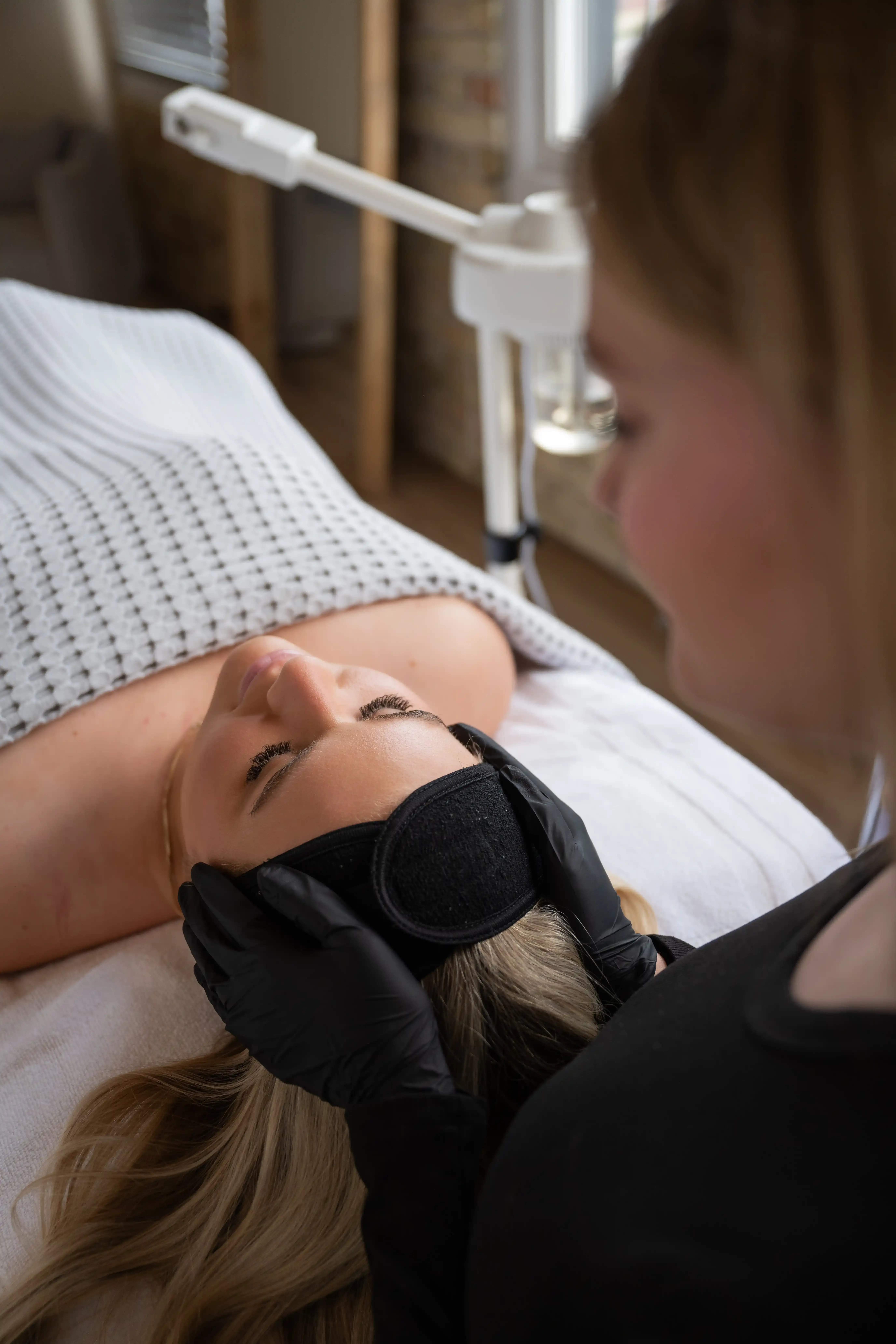 Confident patient portrait after dermaplaning at Eternal Wellness Traverse City
