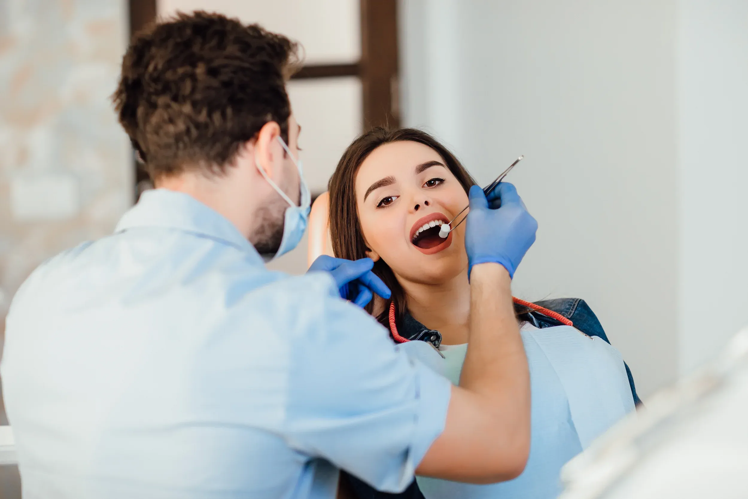 Compassionate emergency dentist comforting a patient at Cook Family Dentistry in Santa Rosa Beach