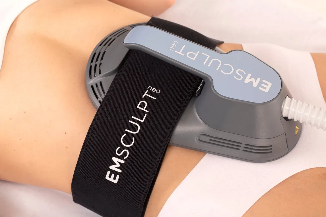 Patient consultation for Emsculpt at Heritage Wellness Crescent Springs