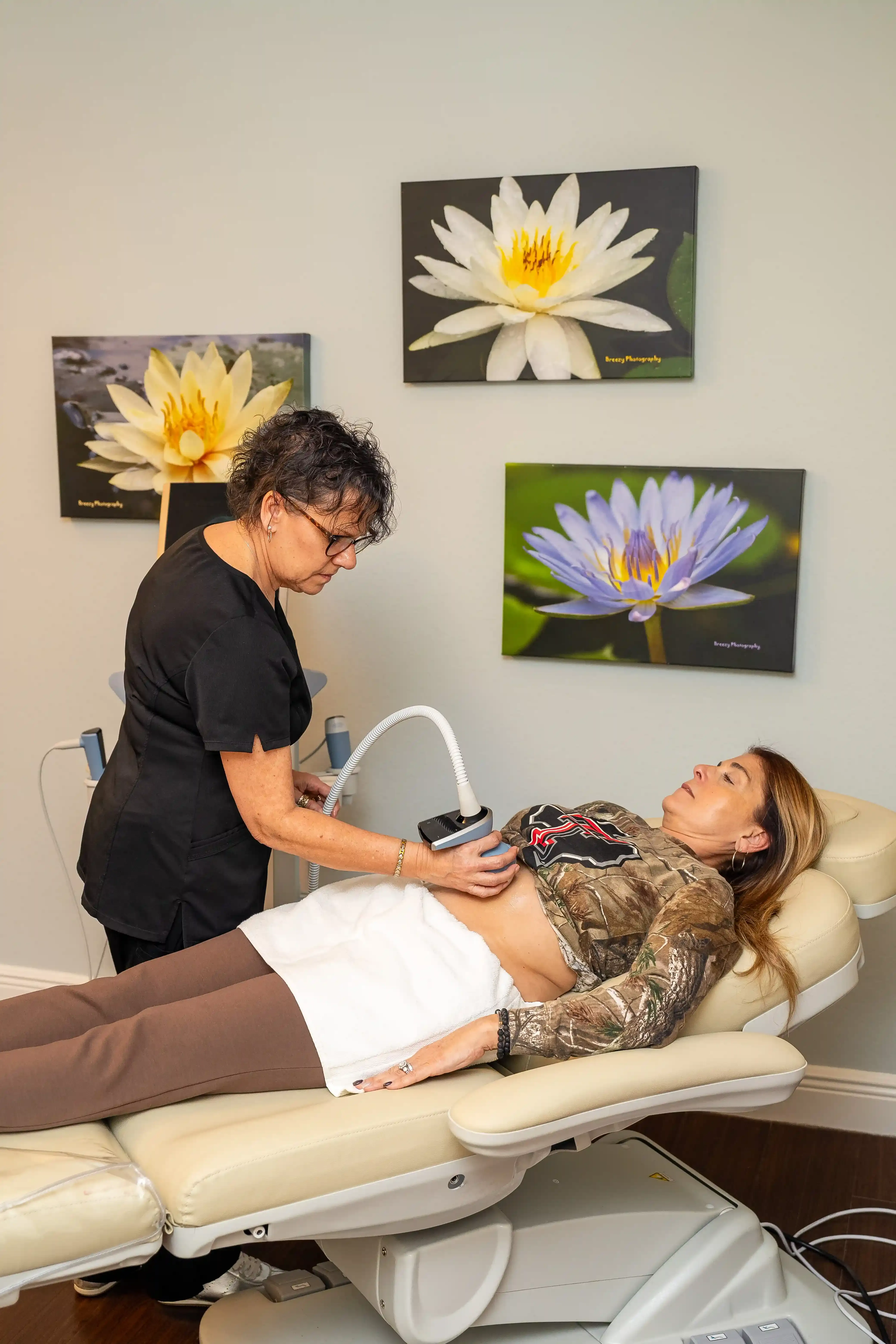 Patient consulting with Dr. Laura Korman about Exion treatment benefits at Arise Integrative Wellness