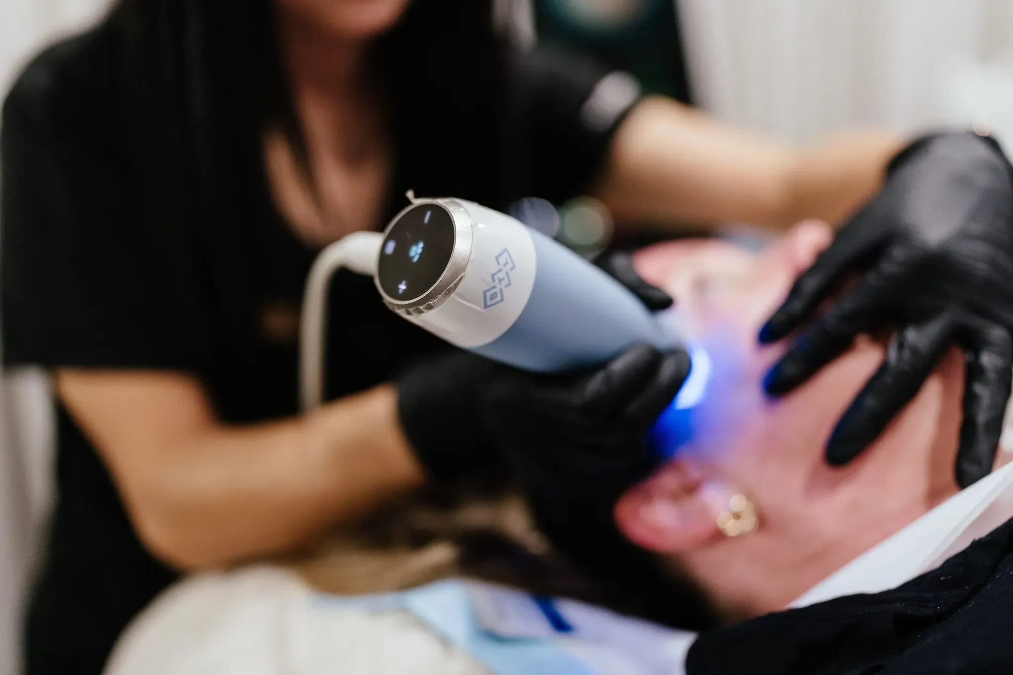 Abstract background representing radiofrequency skin tightening energy at Arise Integrative Wellness