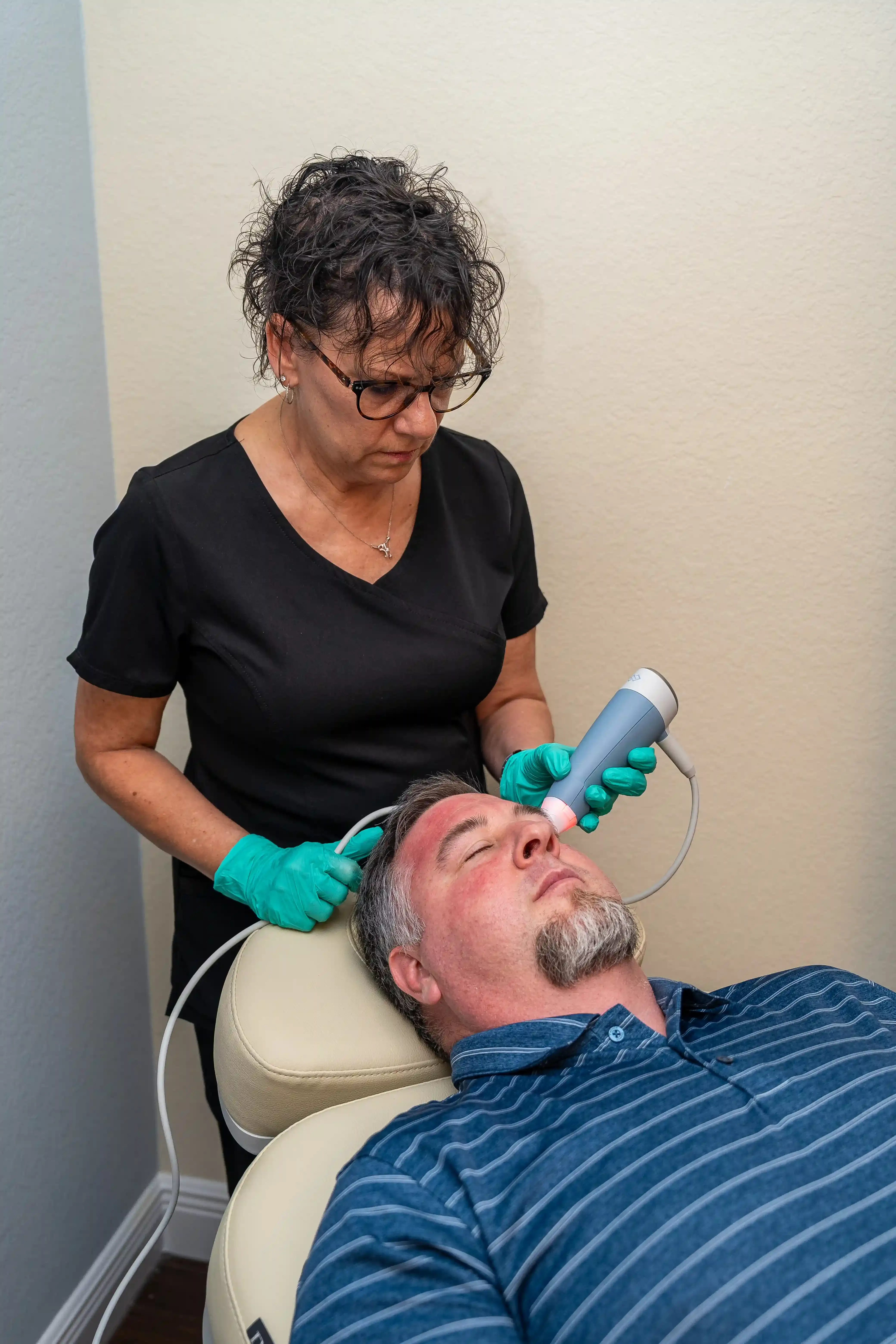 Person concerned about skin firmness at Arise Integrative Wellness Port Charlotte