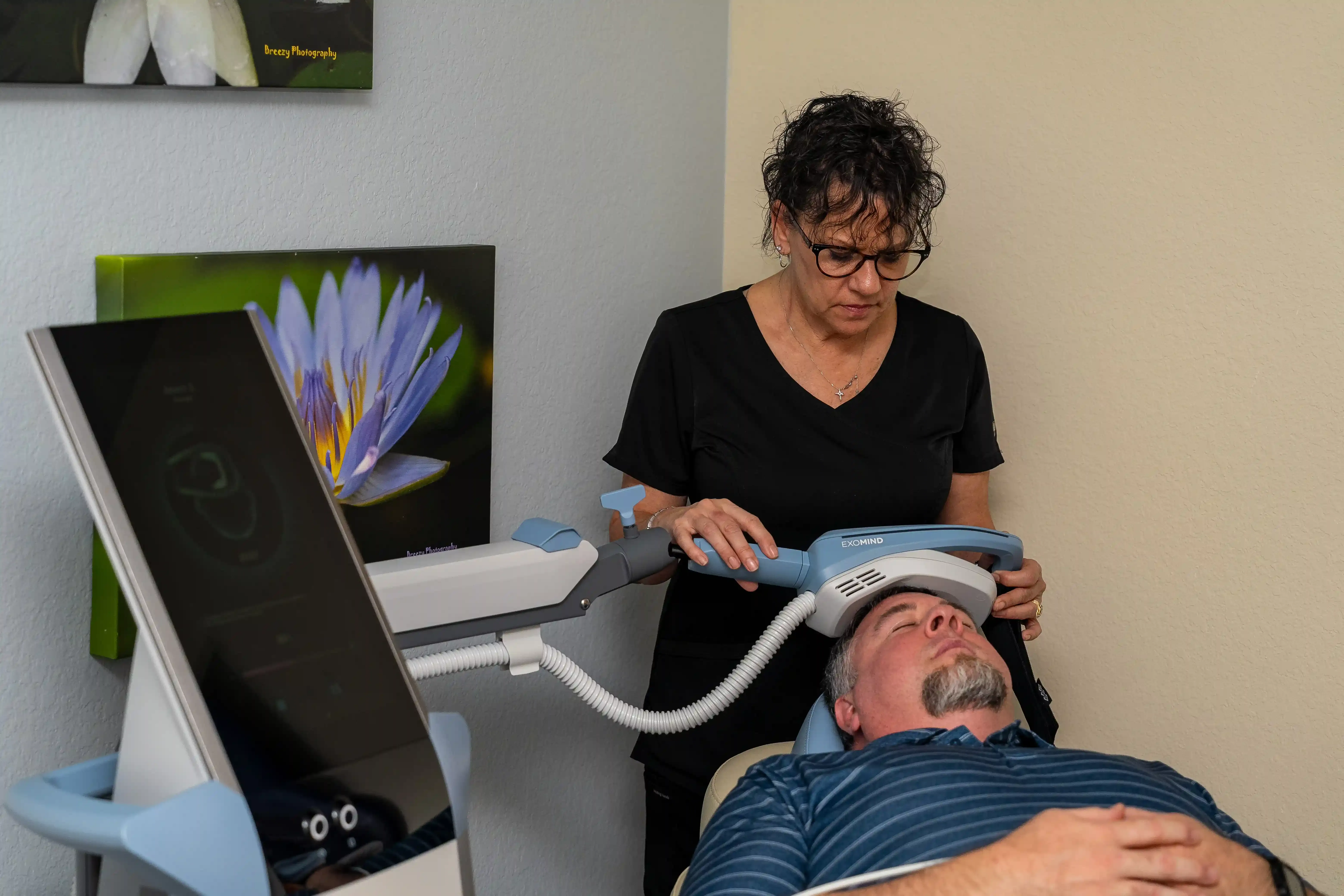 Exomind TMS device used at Arise Integrative Wellness Port Charlotte