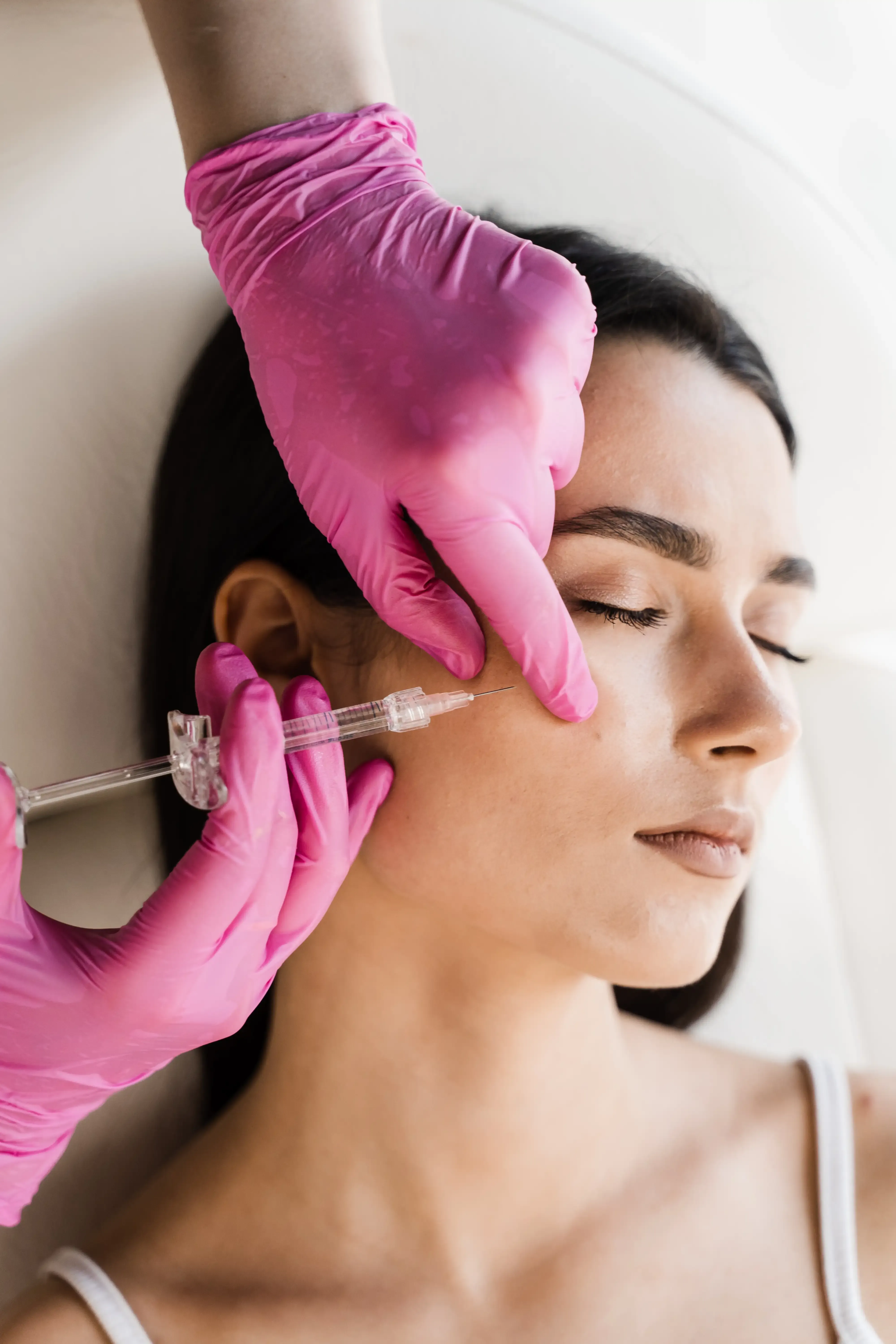 Patient enjoying smooth, rejuvenated skin after Botox at RegalMed Clinic