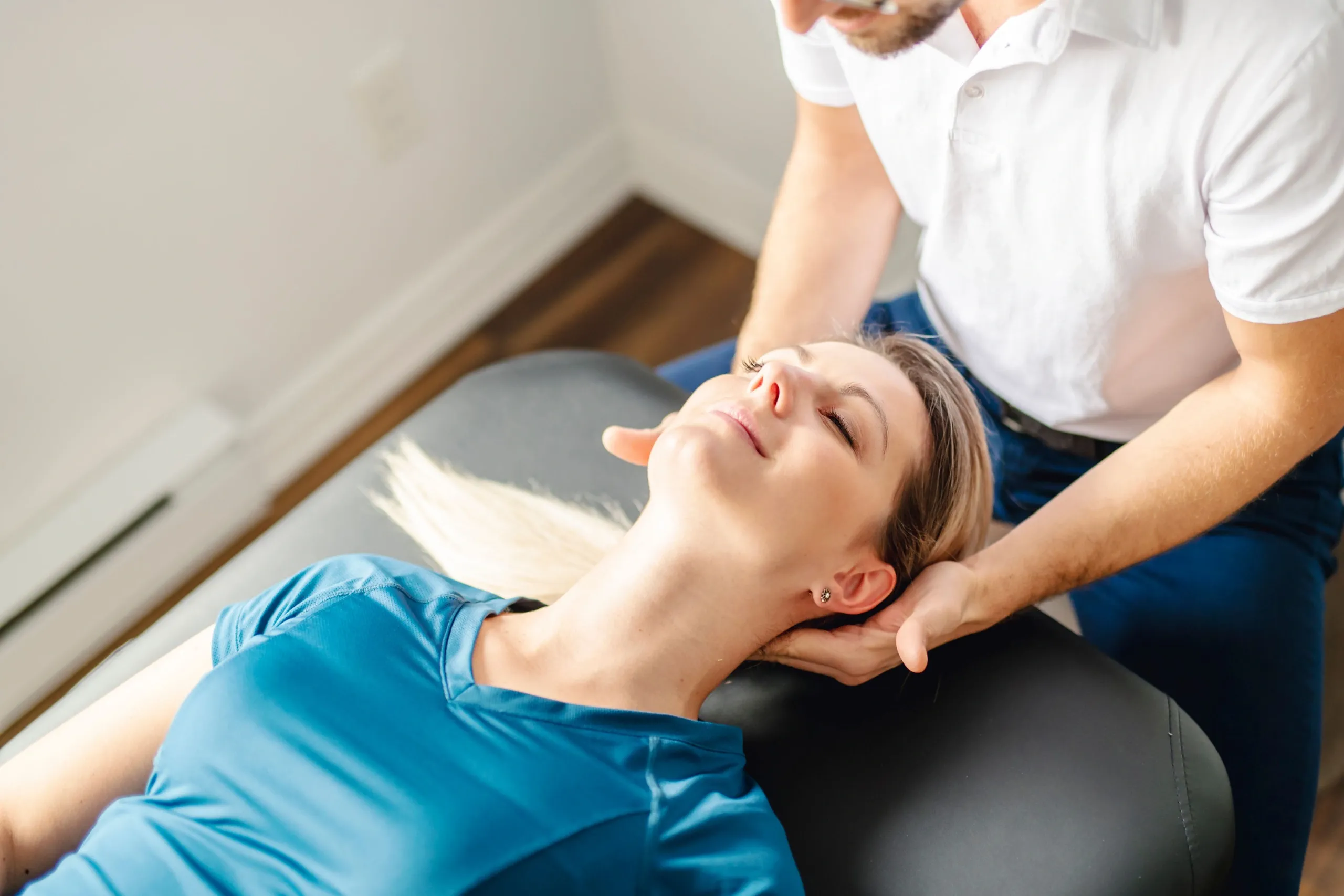 Patient and chiropractor consultation for flexion-distraction therapy at Bensa Chiropractic Bradenton