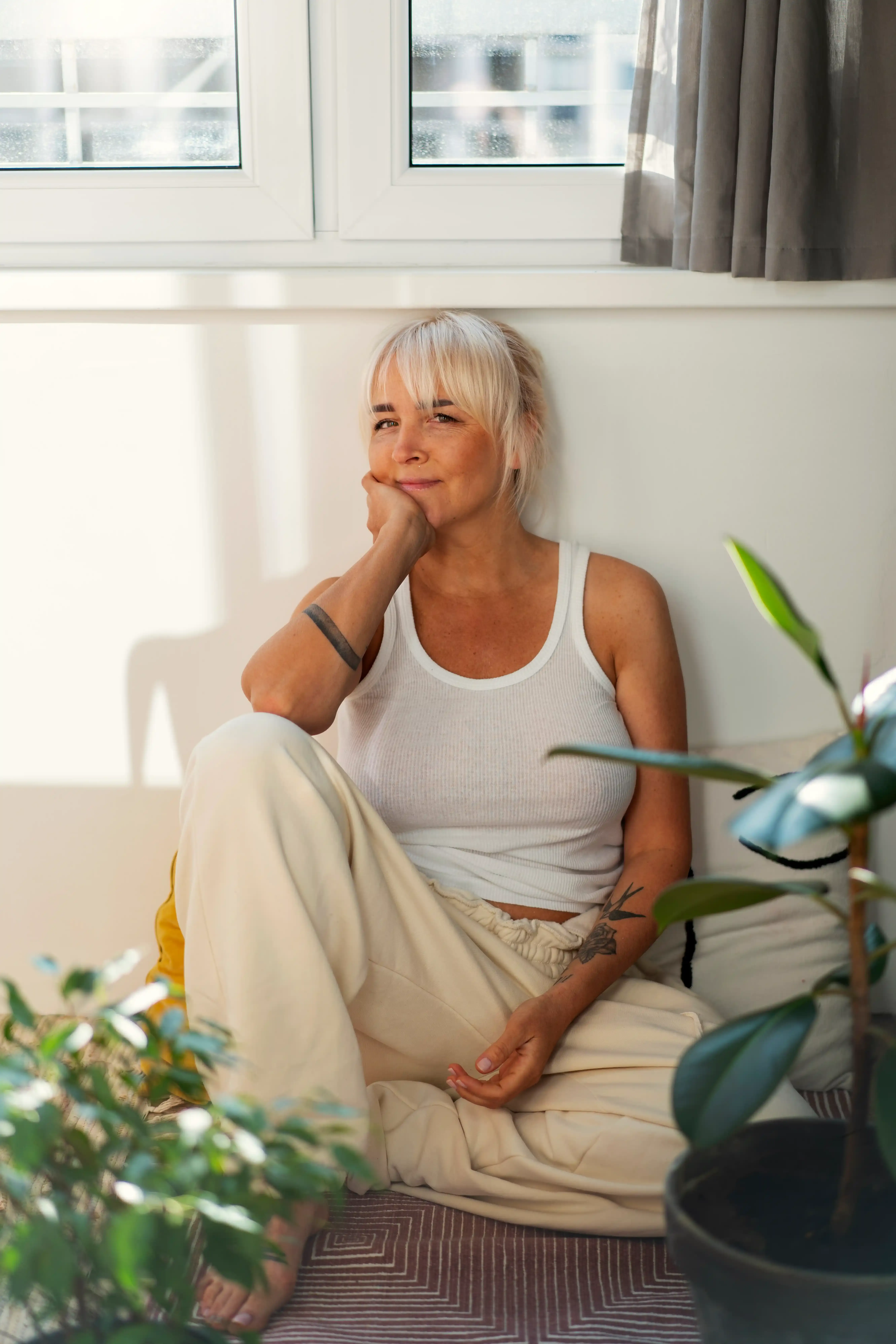 Woman considering feminine wellness options at Hartley Health and Wellness Canton