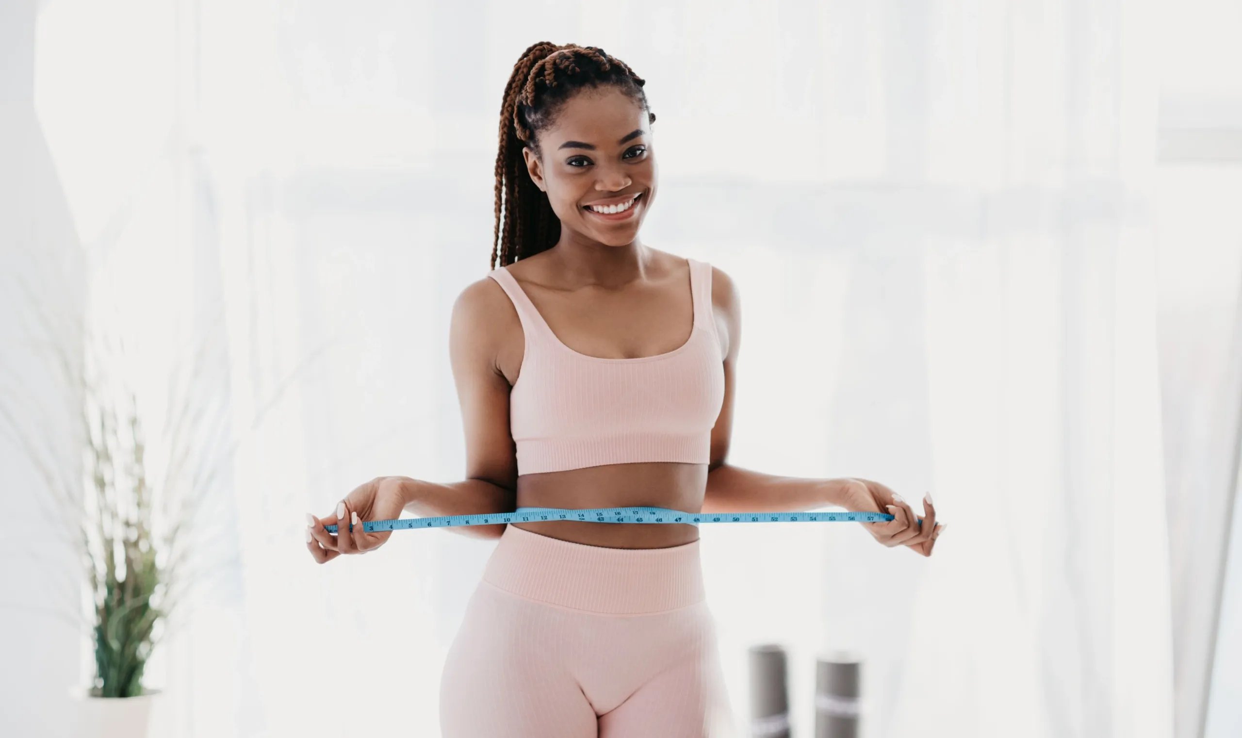 Confident patient portrait after GLP-1 weight loss at WinMind Lutz