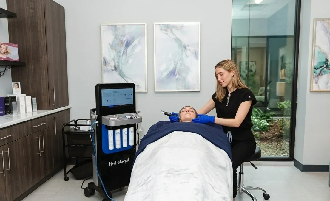 Woman receiving HydraFacial treatment at Pura Vida Med Spa in Fulton, MD