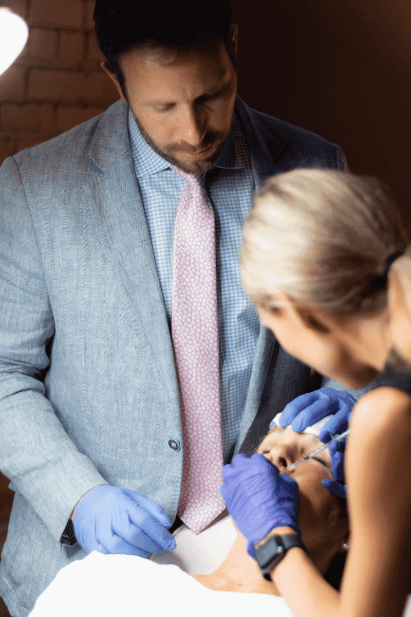 Patient consultation for lip injections at Eternal Wellness Medical Spa Traverse City