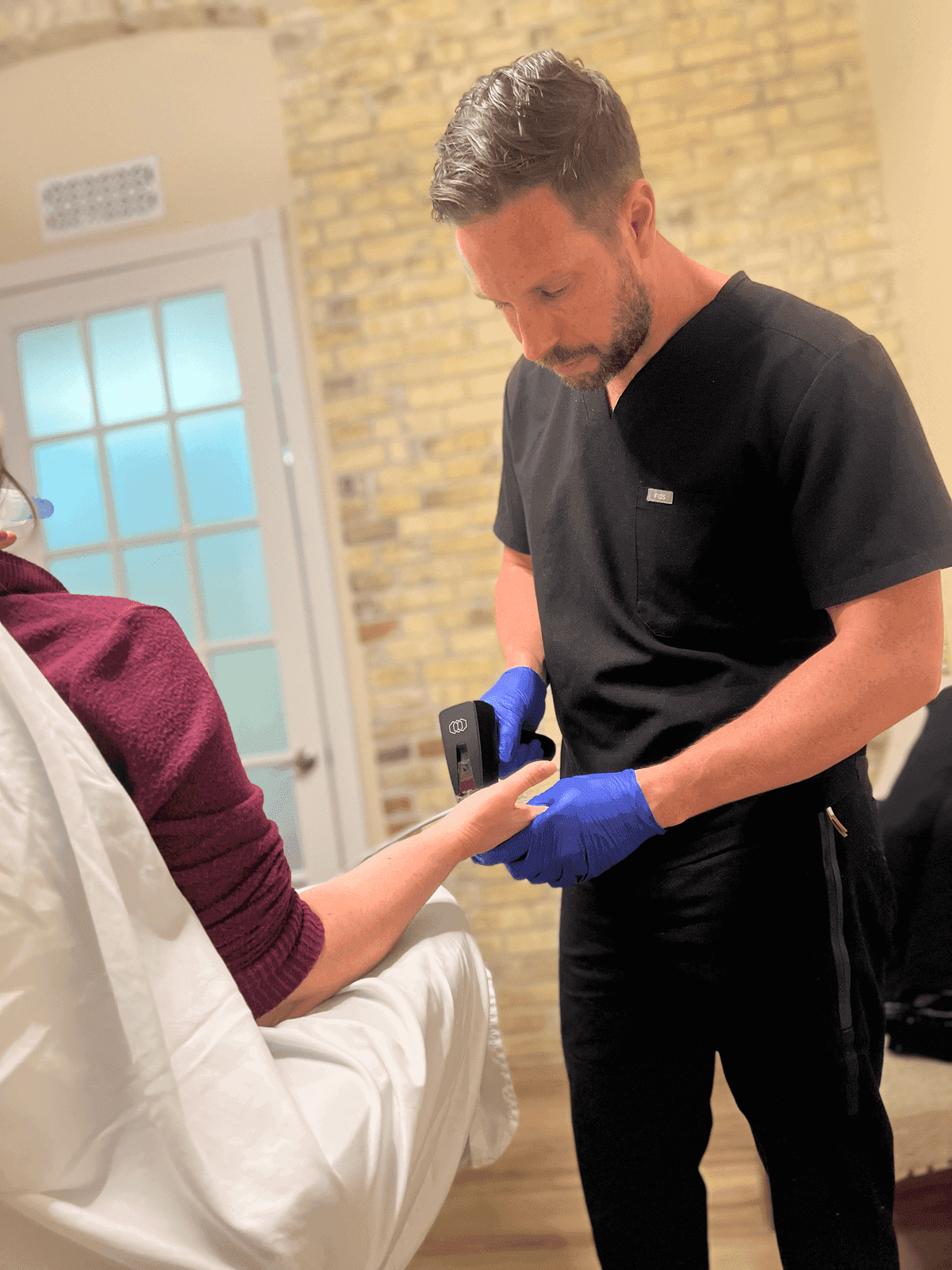 Patient consultation for hyperhidrosis treatment at Eternal Wellness Medical Spa Traverse City