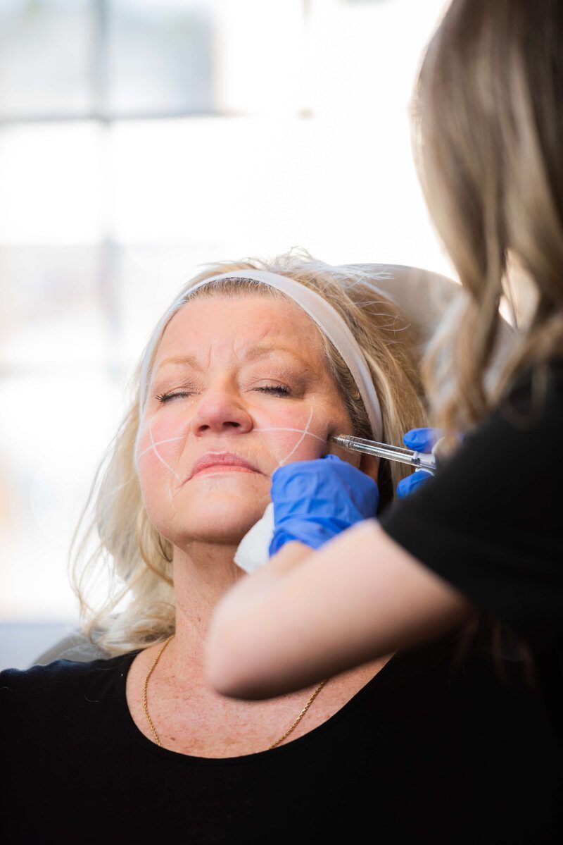 Patient consultation for dermal fillers at Eternal Wellness Medical Spa Traverse City