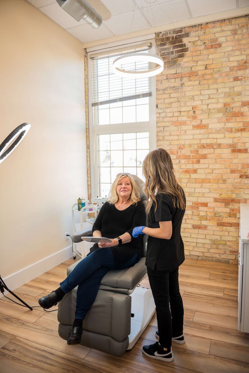 Confident patient portrait after dermal fillers at Eternal Wellness Traverse City