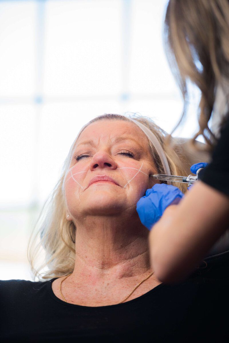 Confident patient portrait after Juvederm at Eternal Wellness Traverse City