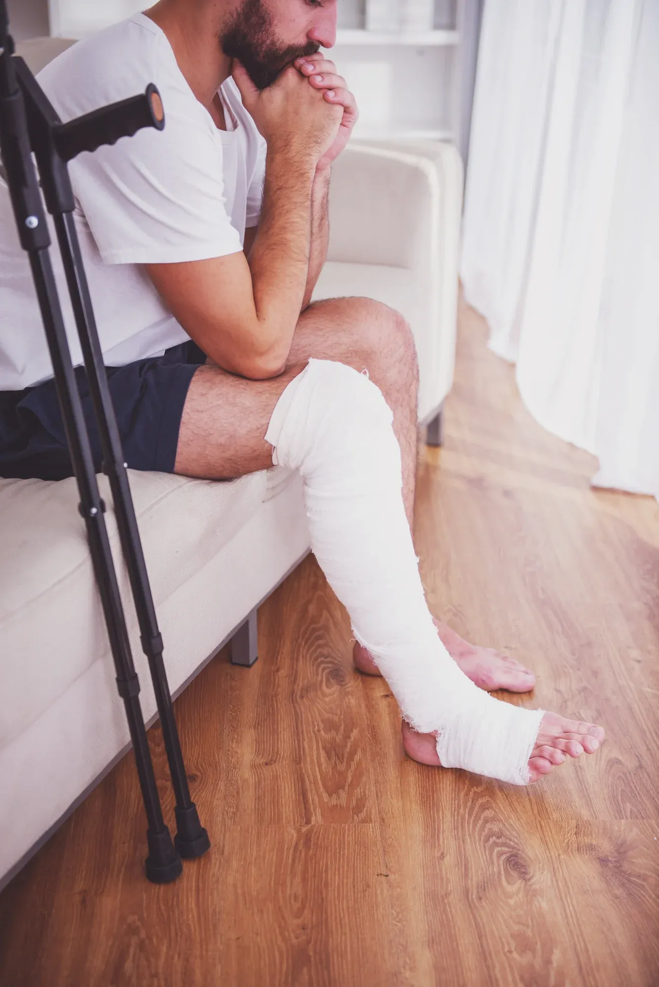 Patient recognizing mobility limitation symptoms at Roots Chiropractic Alma