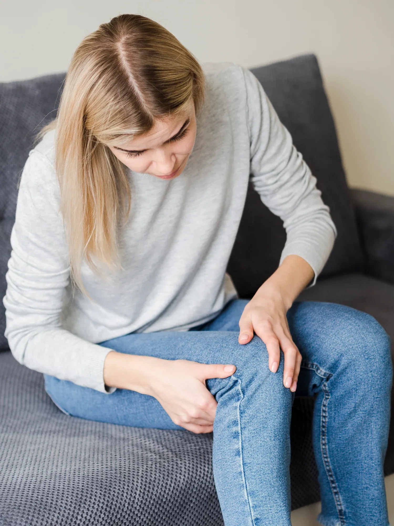Close-up of a swollen knee joint being evaluated at Reliance Primary & Urgent Care