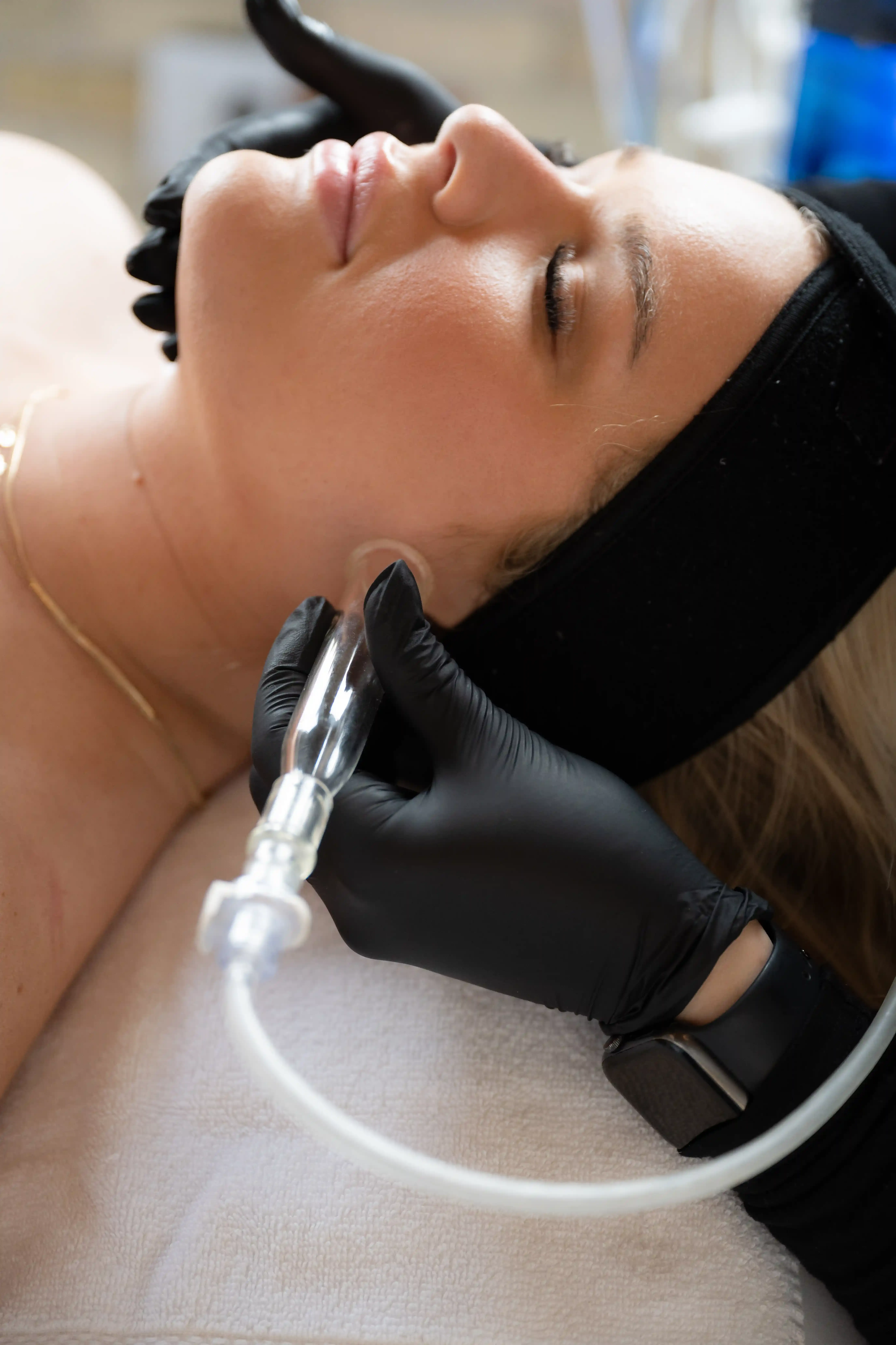 Confident patient portrait after lymphatic drainage at Eternal Wellness Traverse City