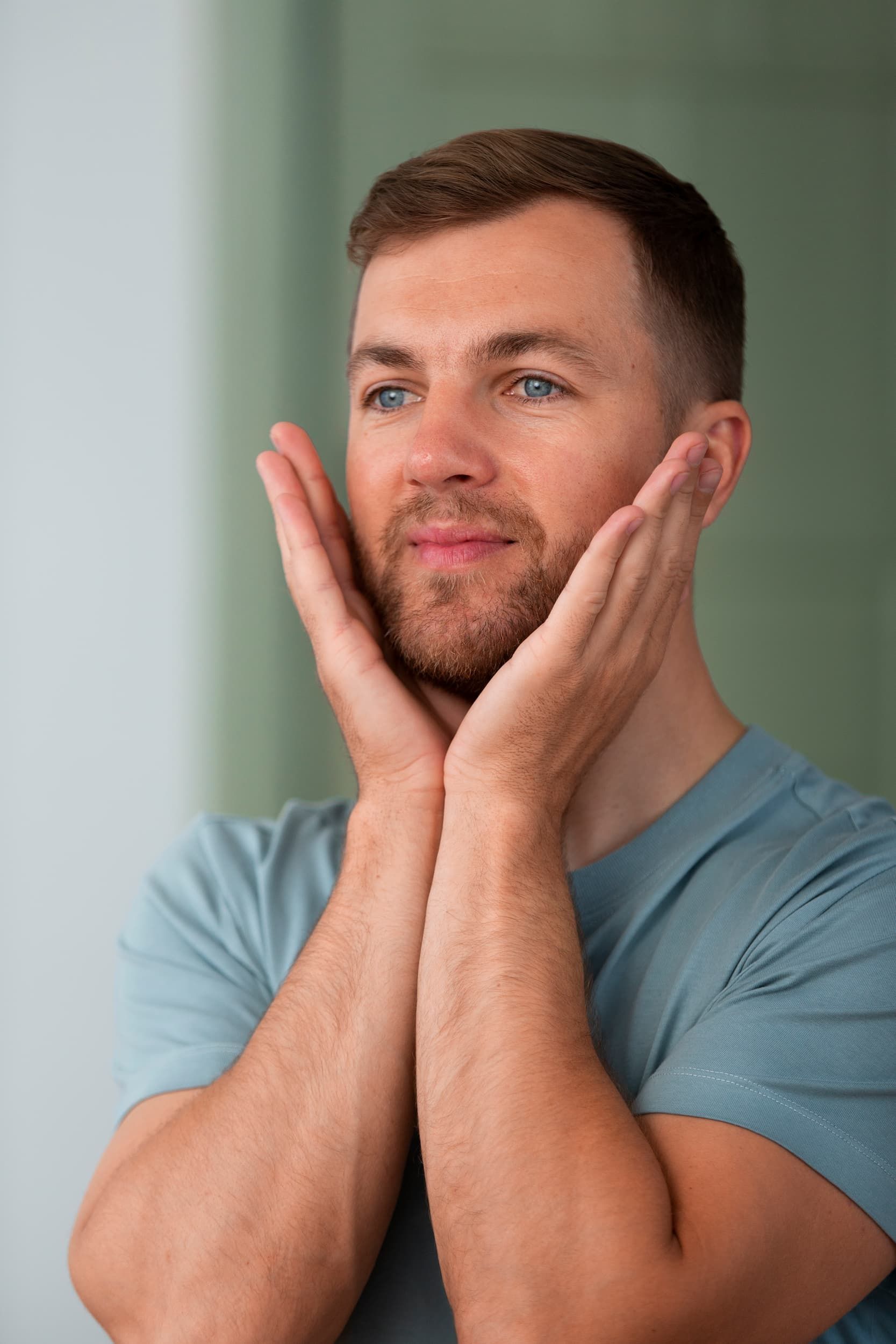 Person experiencing jaw pain and tension headache at Dental World Longwood FL