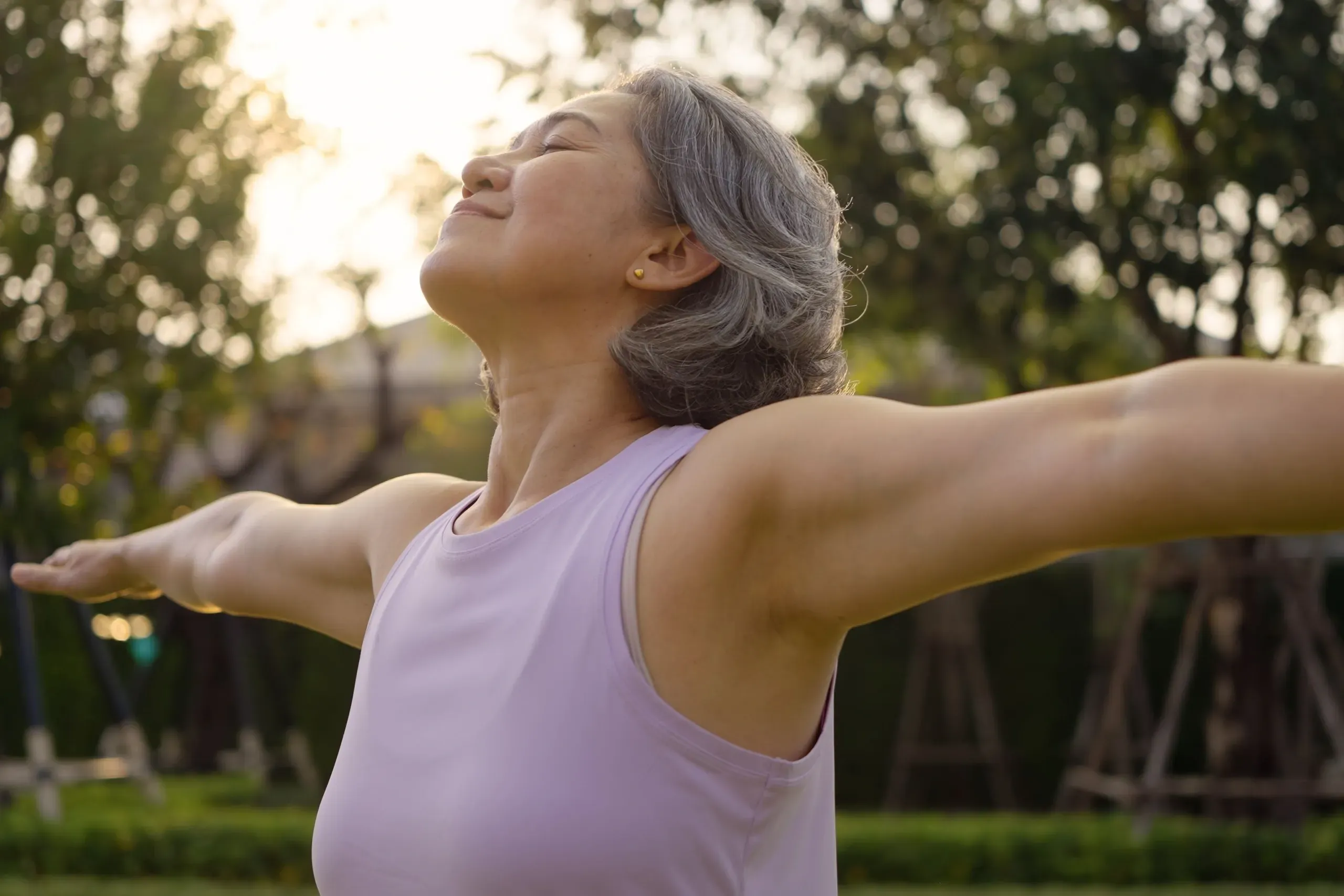 Woman in her fifties reflecting calmly at Hartley Health and Wellness Canton