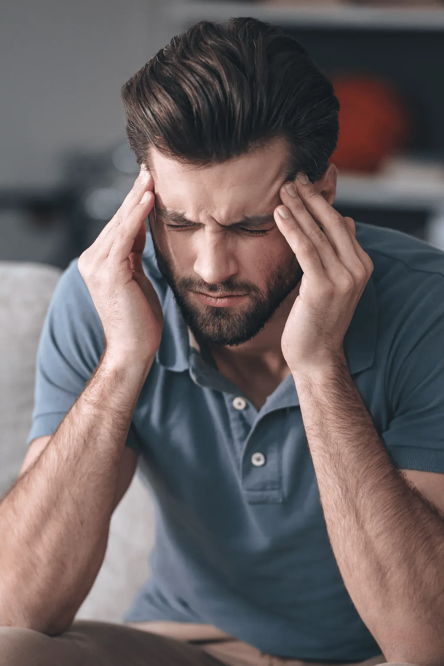 Patient describing headache symptoms during a consultation at Resurgent Health Fargo