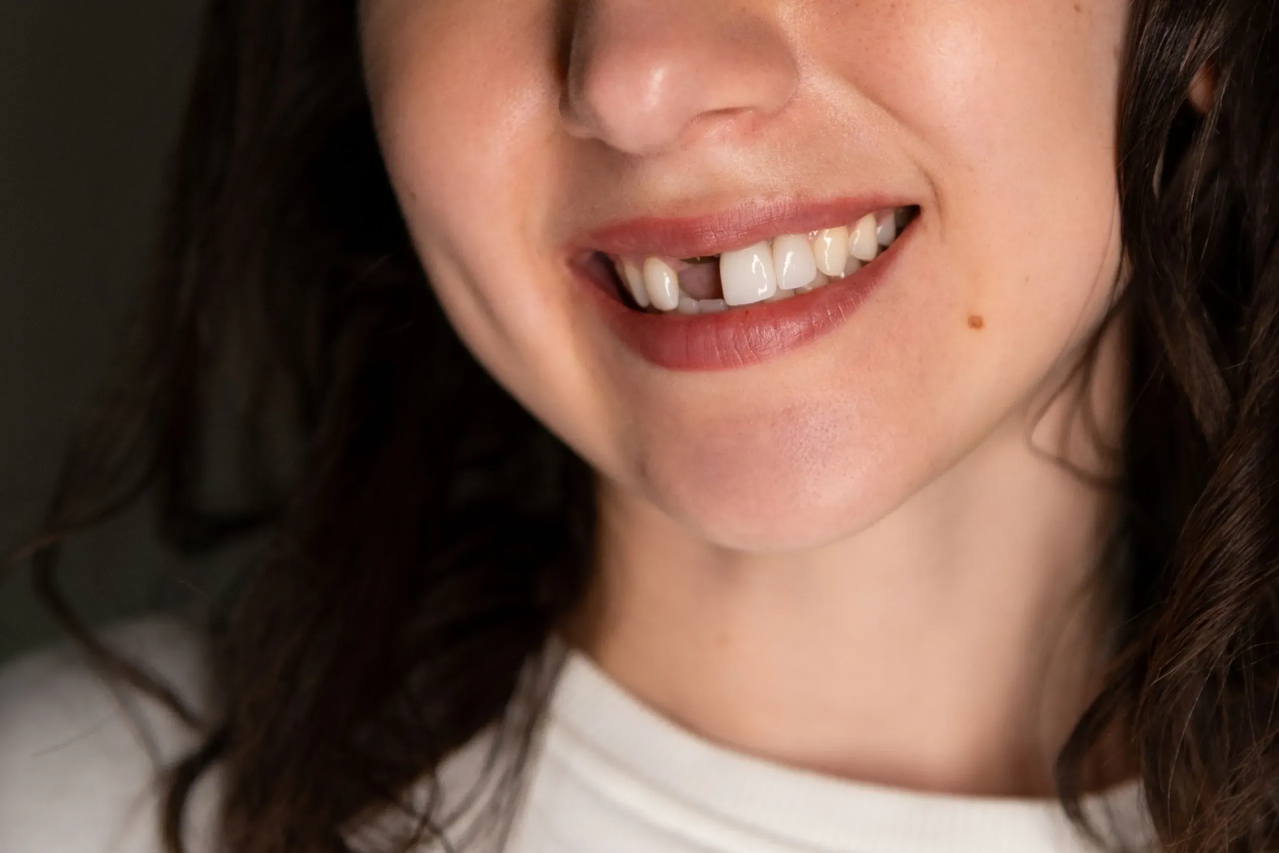 Patient smiling after tooth replacement consultation at Cook Family Dentistry